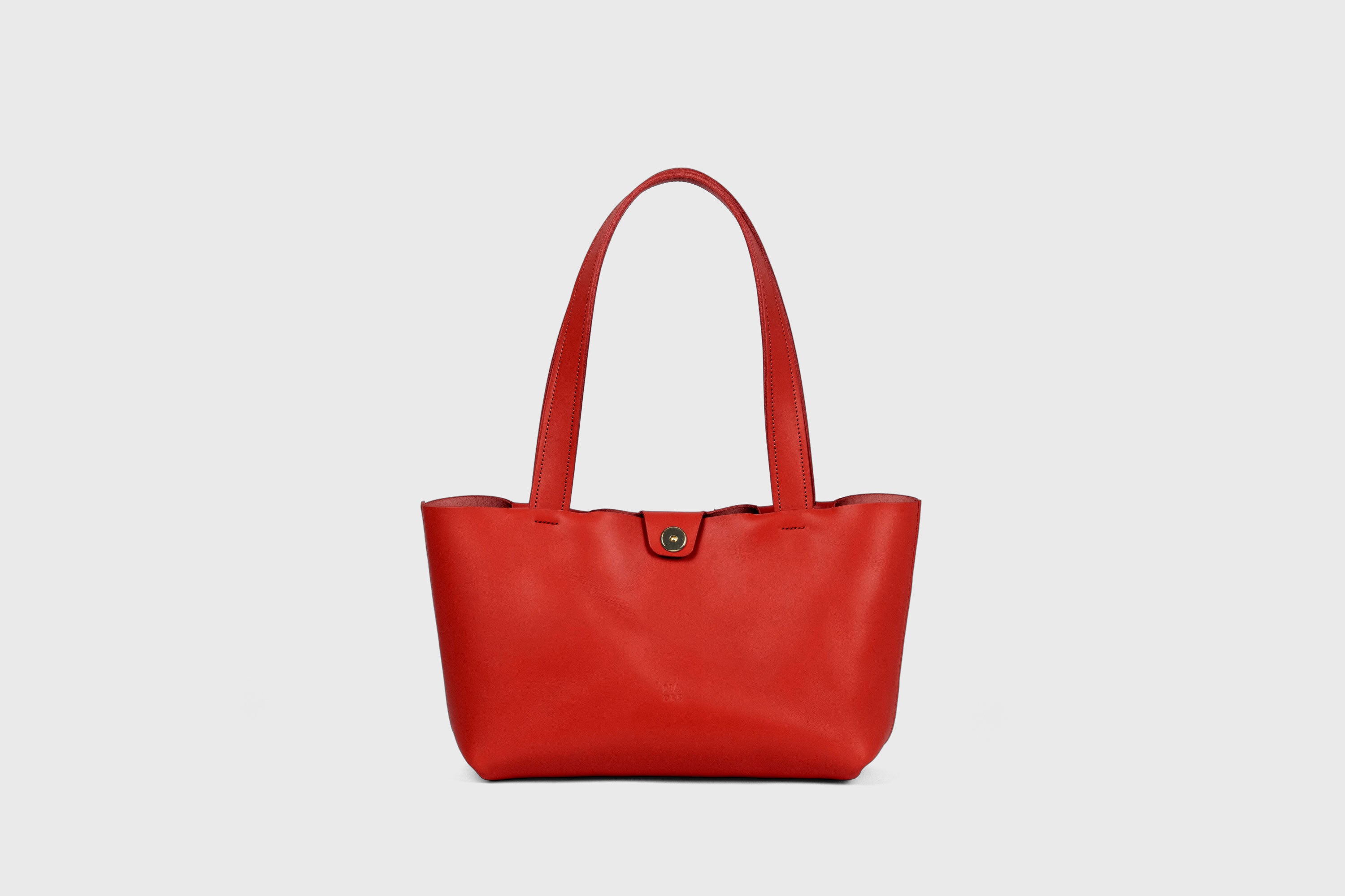 Karin Bag Closure In Red Color In Vegetable Tanned Leather Magnetic Closure Open Top Minimalistic Design Barcelona Spain