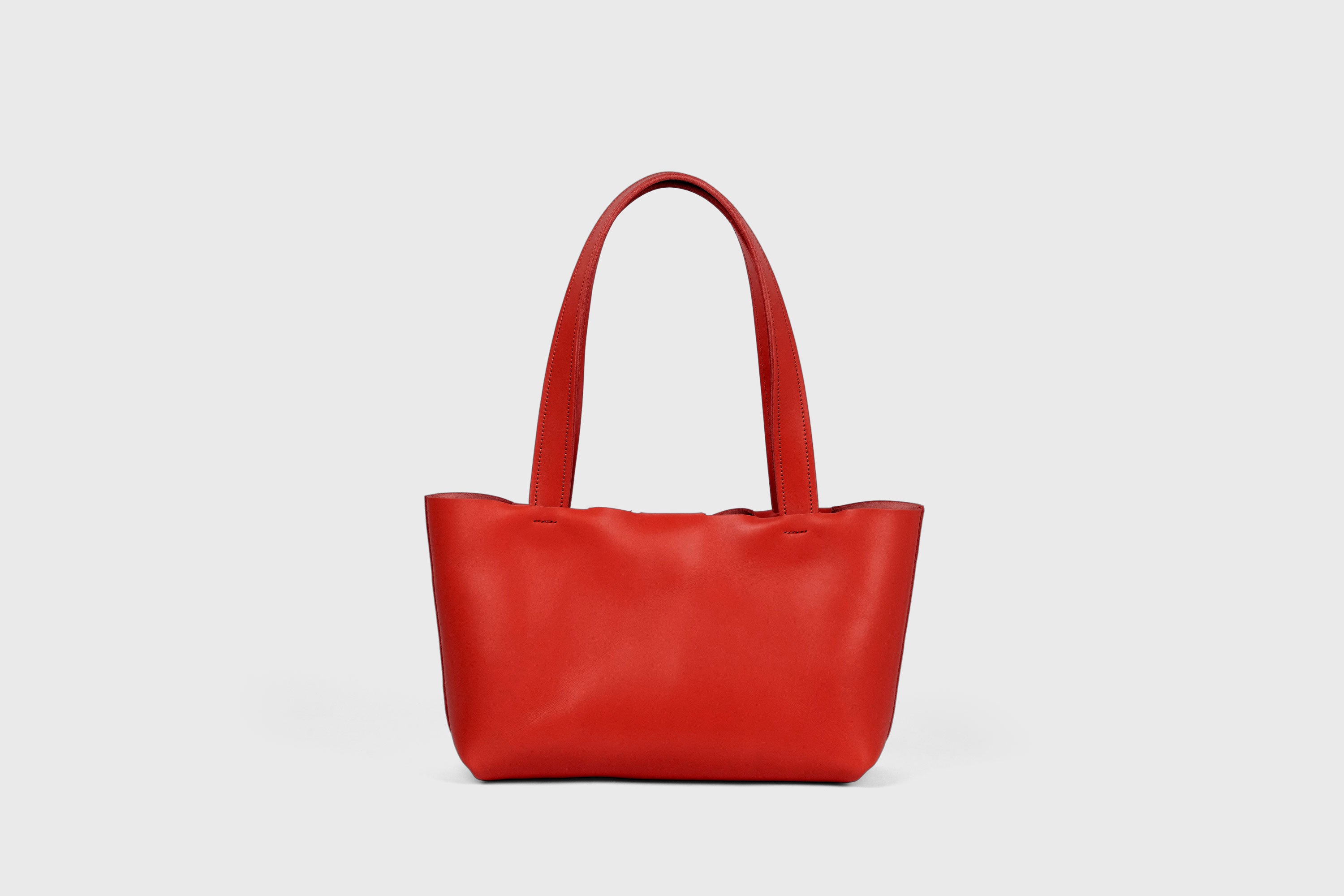 Karin Bag Closure In Red Color In Vegetable Tanned Leather Magnetic Closure Open Top Minimalistic Design Barcelona Spain