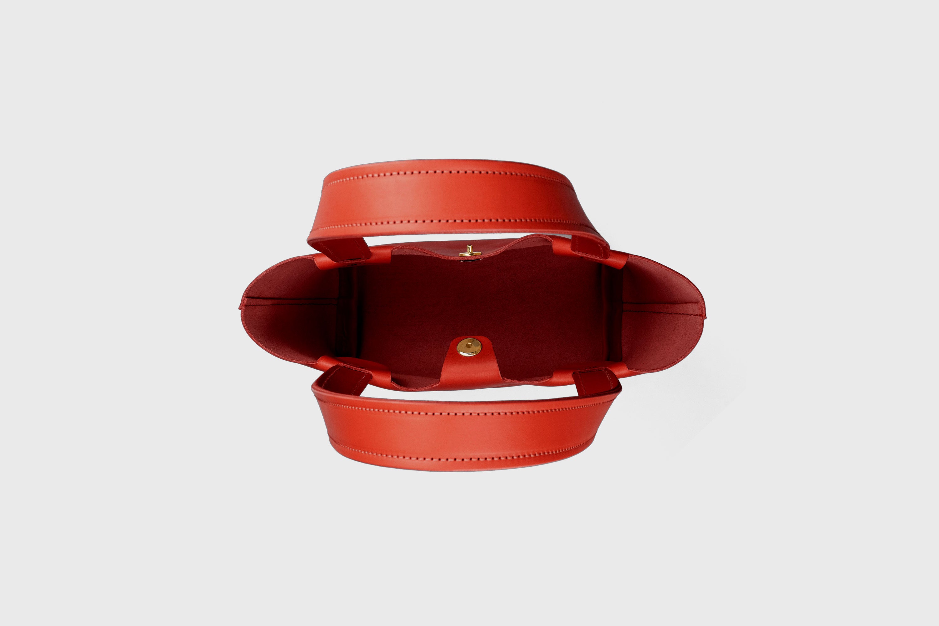 Karin Bag Closure In Red Color In Vegetable Tanned Leather Magnetic Closure Open Top Minimalistic Design Barcelona Spain