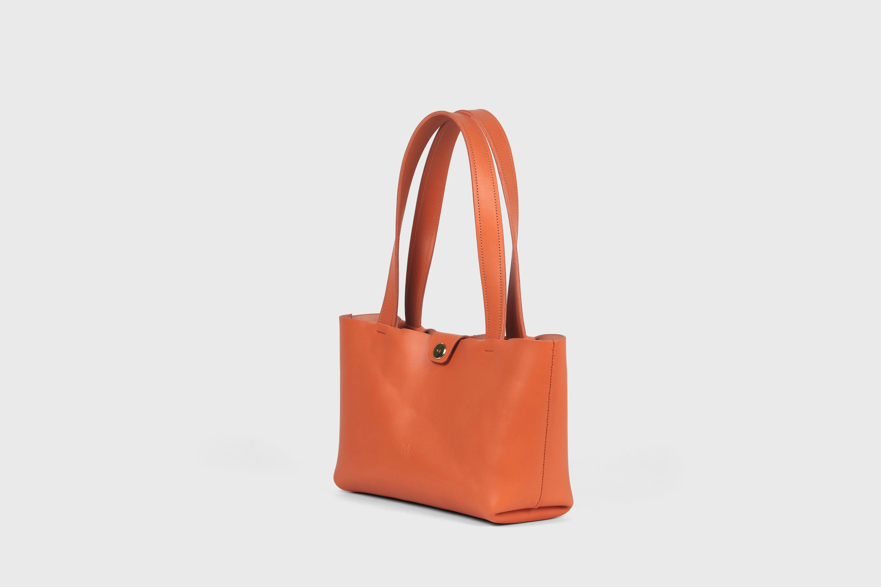 Karin Tote Bag Small Premium Leather Orange Color Magnetic Closure Minimalist Design Atelier Madre Manuel Dreesmann Barcelona Spain