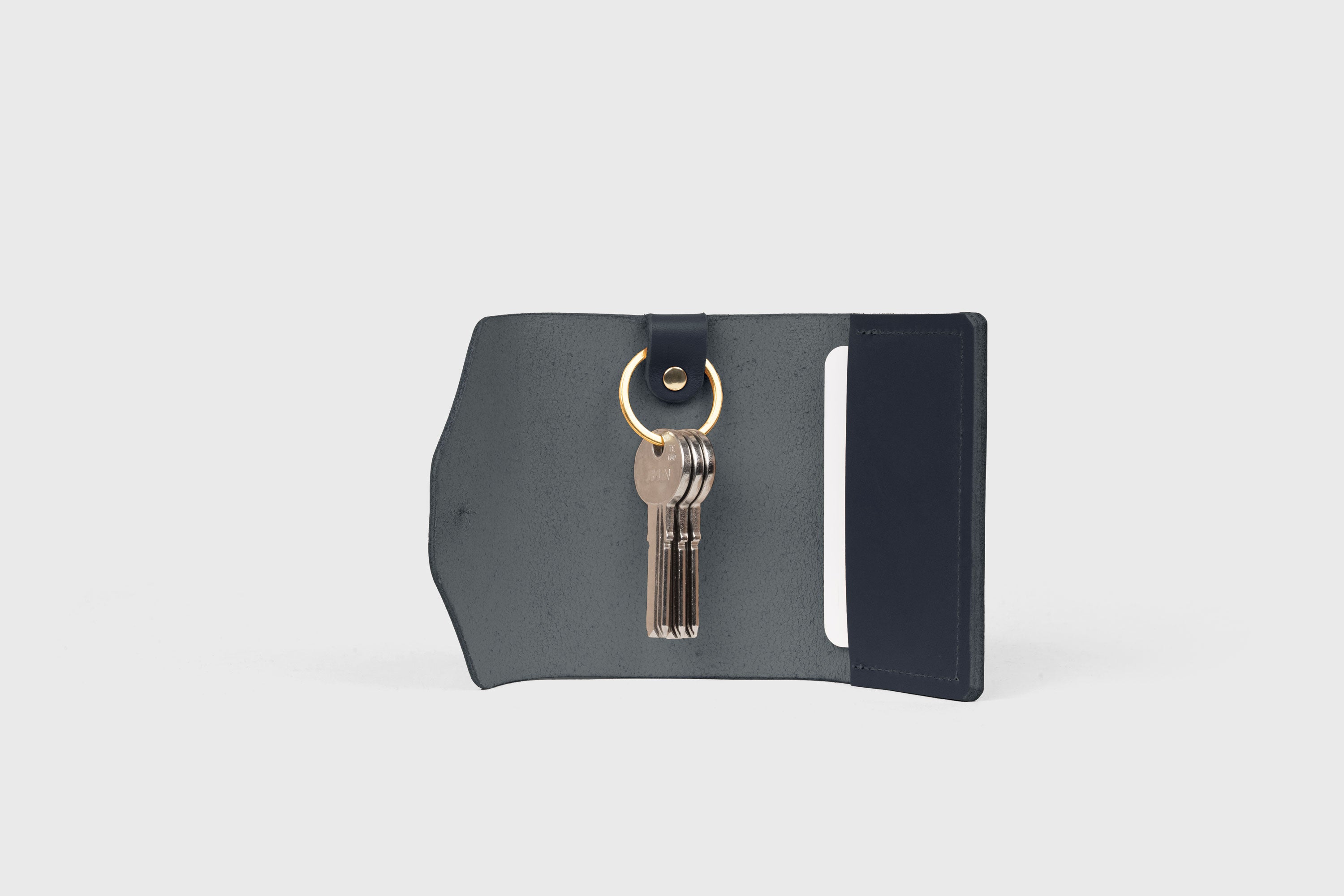 Key and Card Wallet In Marine Blue Color In Vegetable Tanned Leather Minimalistic Design Atelier Madre Manuel Dreesmann Barcelona Spain 