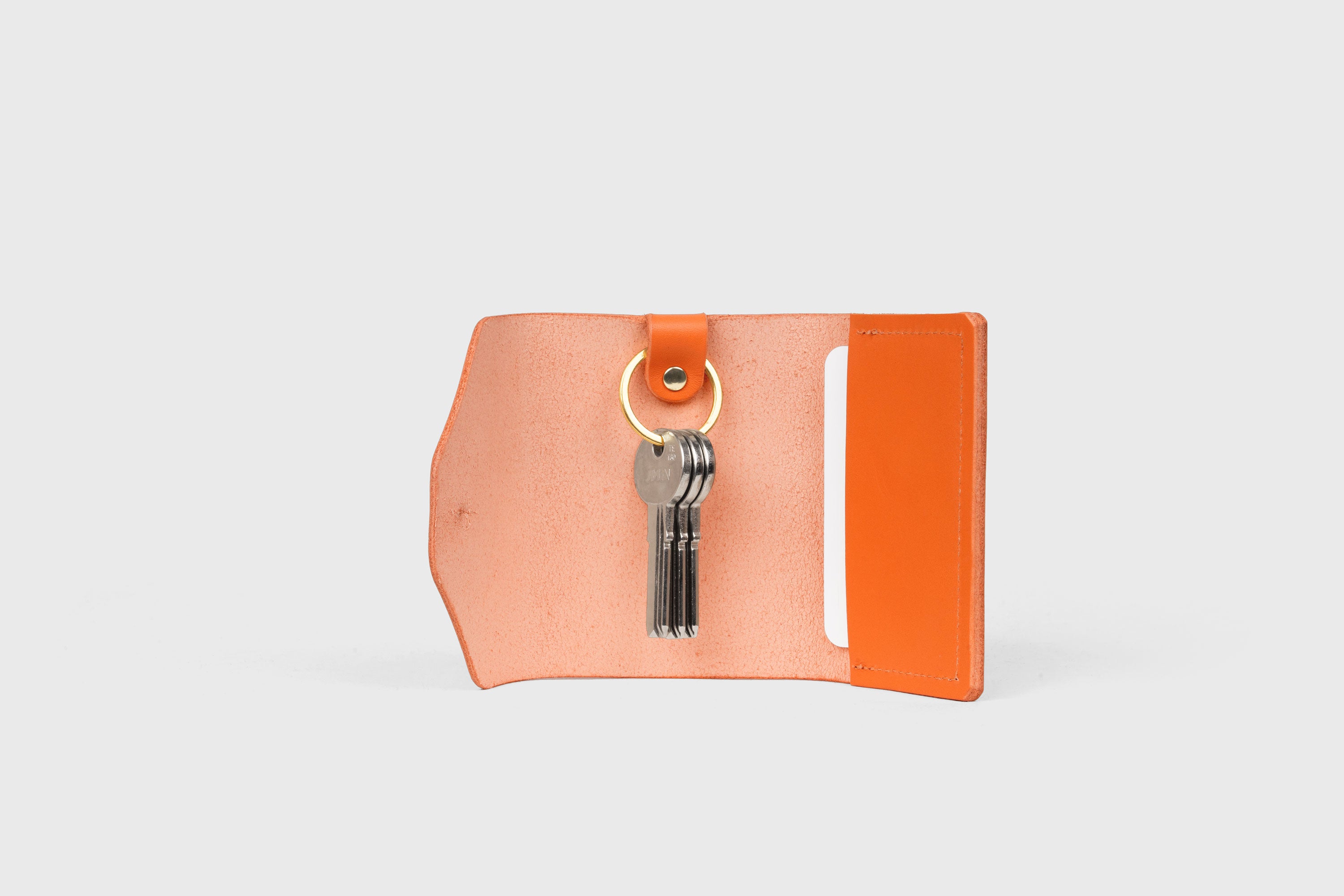 Key and Card Wallet In Orange Color In Vegetable Tanned Leather Minimalistic Design Atelier Madre Manuel Dreesmann Barcelona Spain 