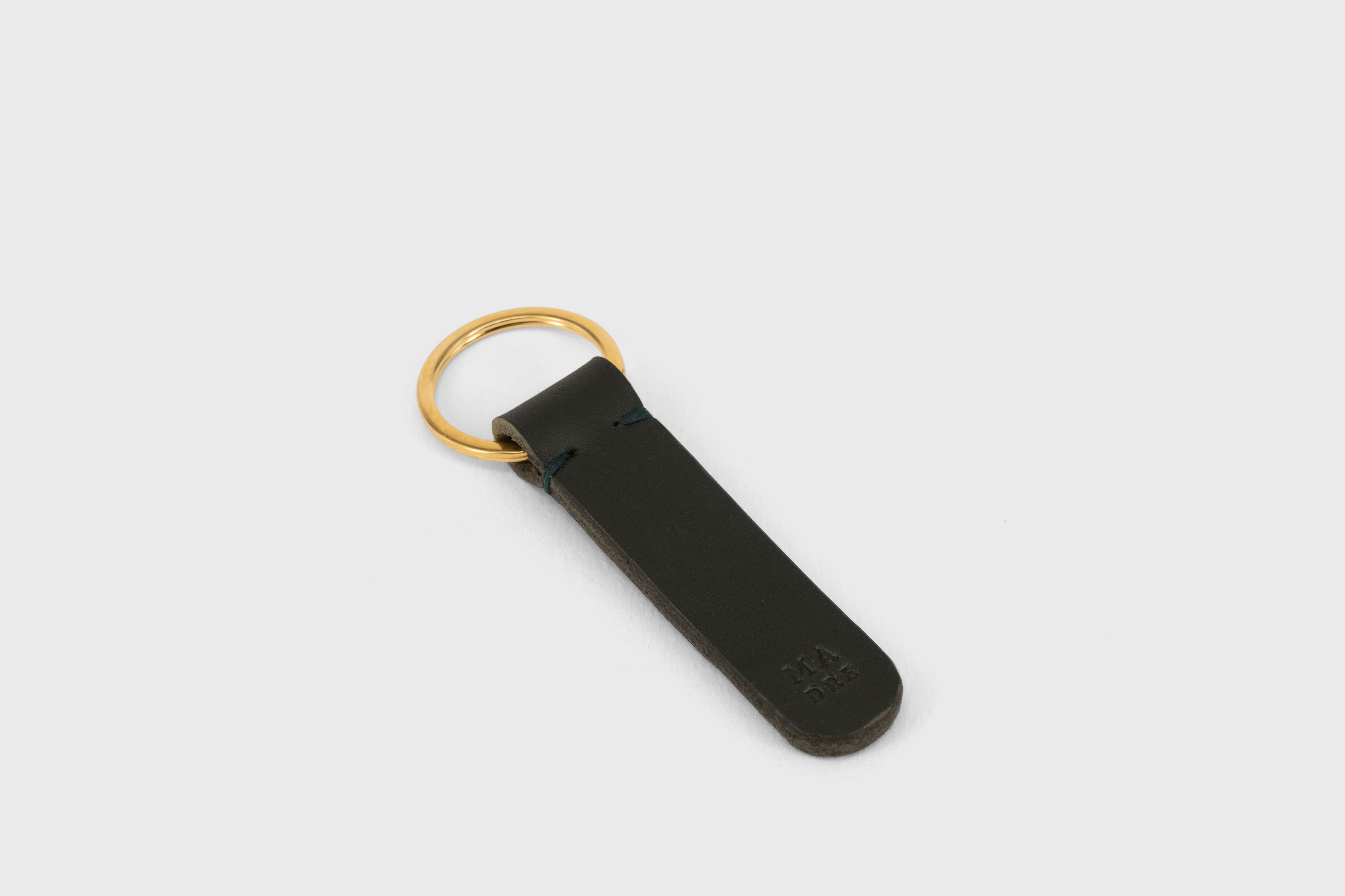 Key Ring Leather Dark Olive Green Color Fob Minimalist Designer Vegetable Tanned Full Grain Handcrafted Personalised Premium Quality Gold Atelier Madre Manuel Dreesmann Barcelona Spain