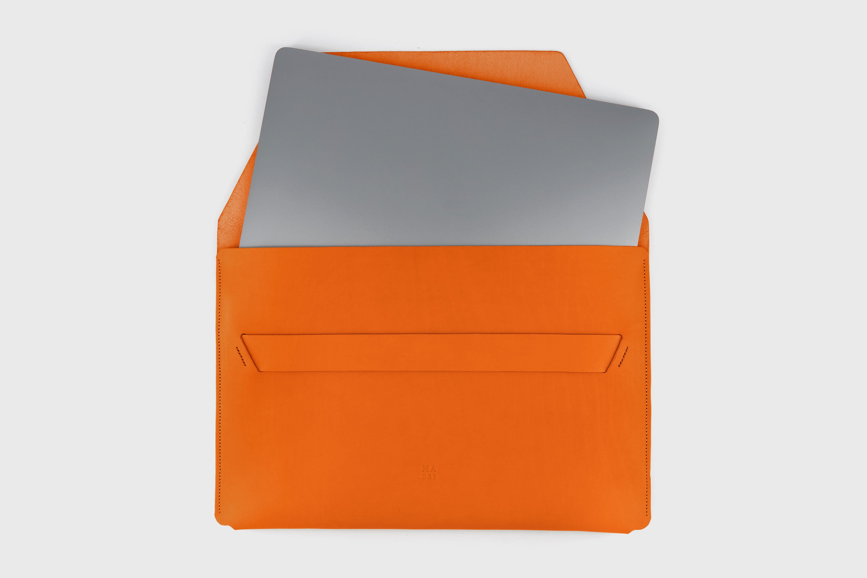 Leather Sleeve For MacBook Pro Air Orange Color Full Grain Vegetable Tanned Leather Modern Minimalist Design Premium Quality Protection Business Sleek Atelier Madre Manuel Dreesmann Barcelona Spain