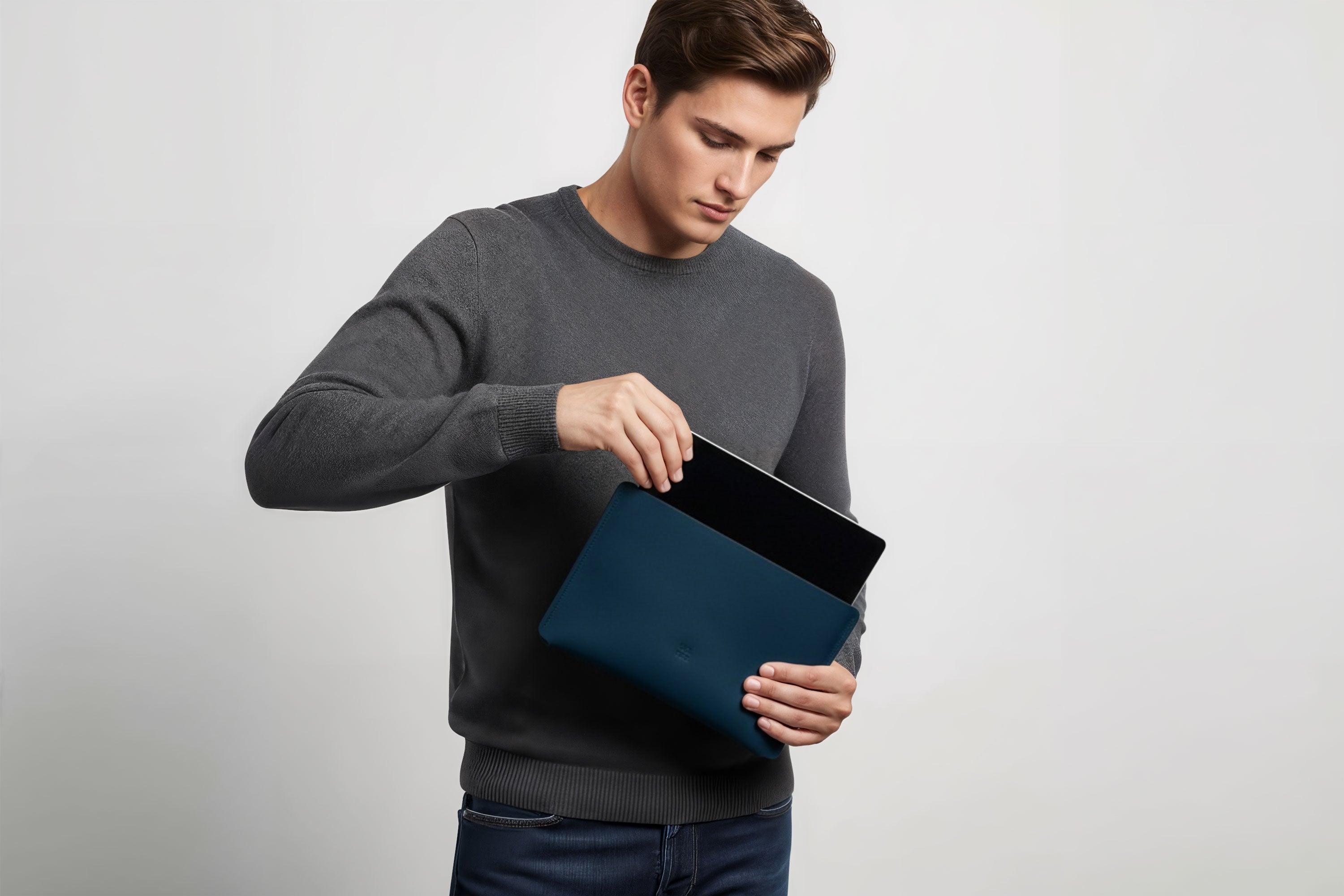 Leather Sleeve for iPad Leather Horizontal Marine Blue On Model Minimal Design Atelier Madre Manuel Dreesmann Barcelona
