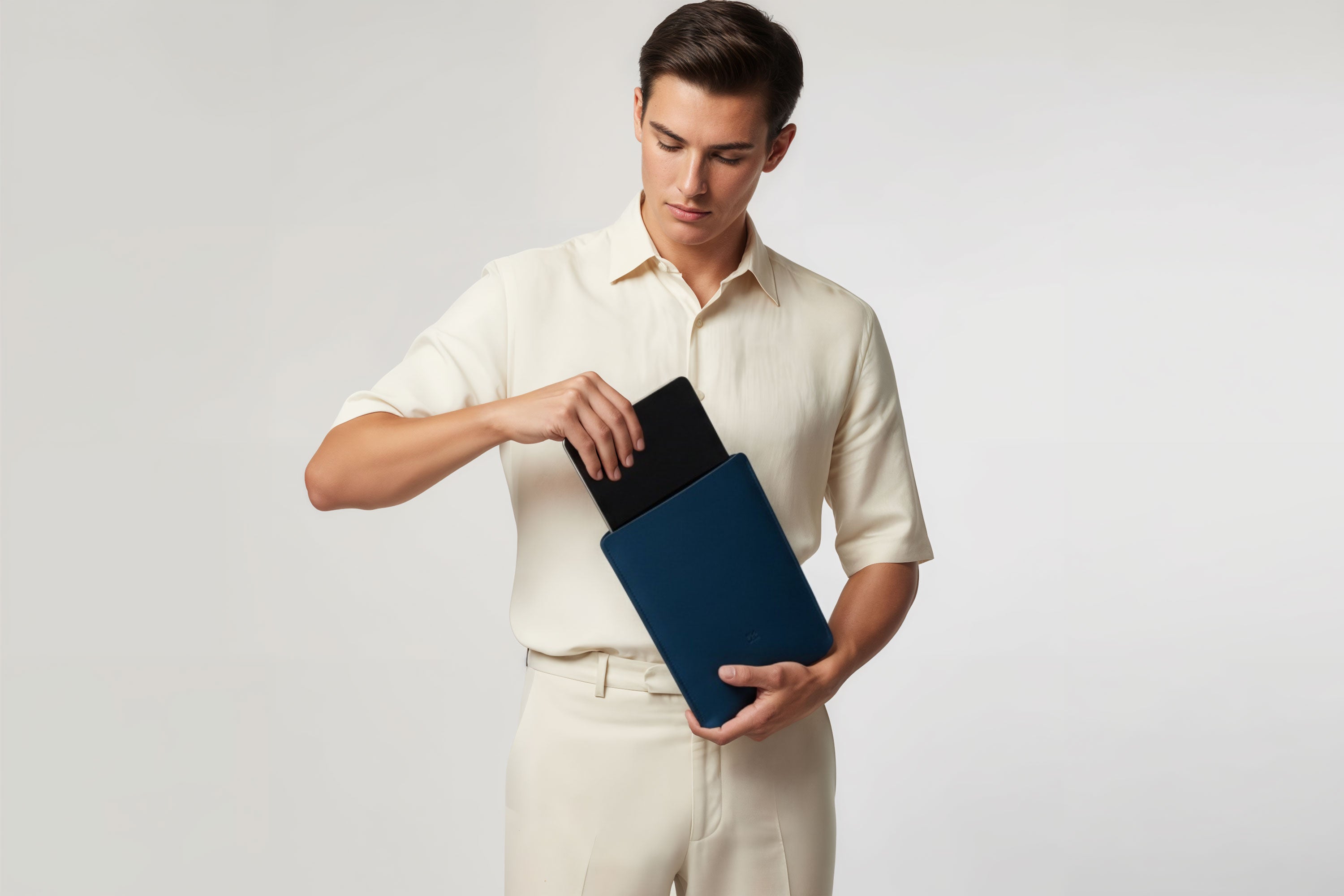 Leather Sleeve for iPad Leather Vertical Marine Blue On Model Minimal Design Atelier Madre Manuel Dreesmann Barcelona