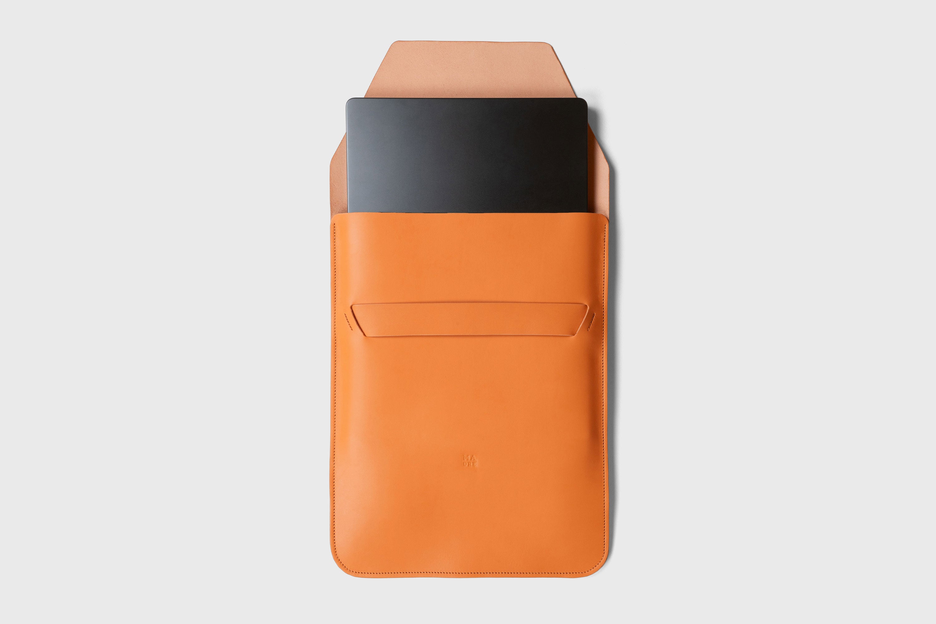 Leather Sleeve MacBook Vertical Orange Color Protection Case Bag Laptop Sleeve Real Full Grain Leather Minimalist Sleek Modern Design Atelier Madre Manuel Dreesmann Barcelona Spain