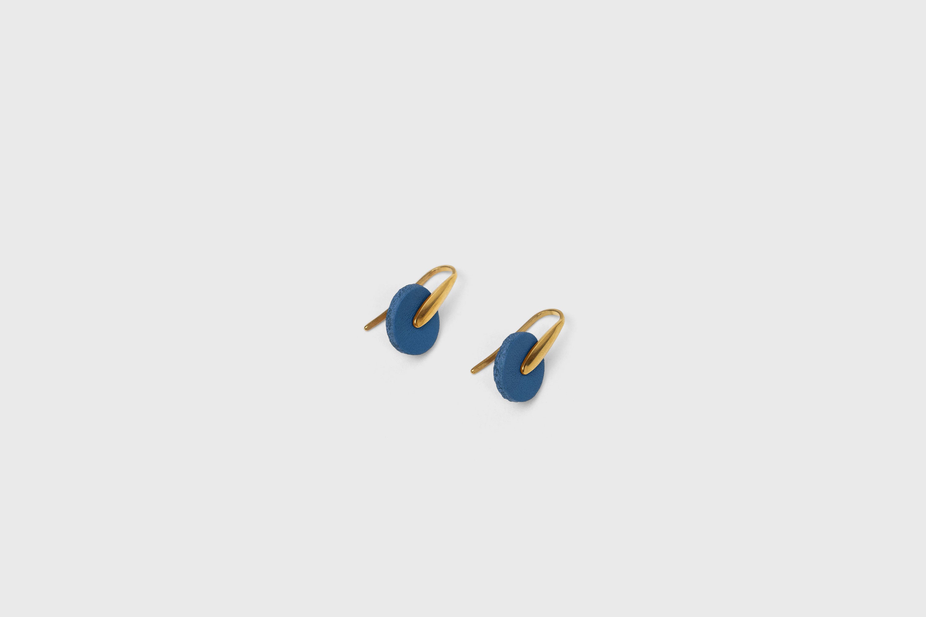 Lina Earrings In Royal Blue Color In Vegetable Tanned Leather Brass Hook Minimalistic Design Atelier Madre Manuel Dreesmann Barcelona Spain