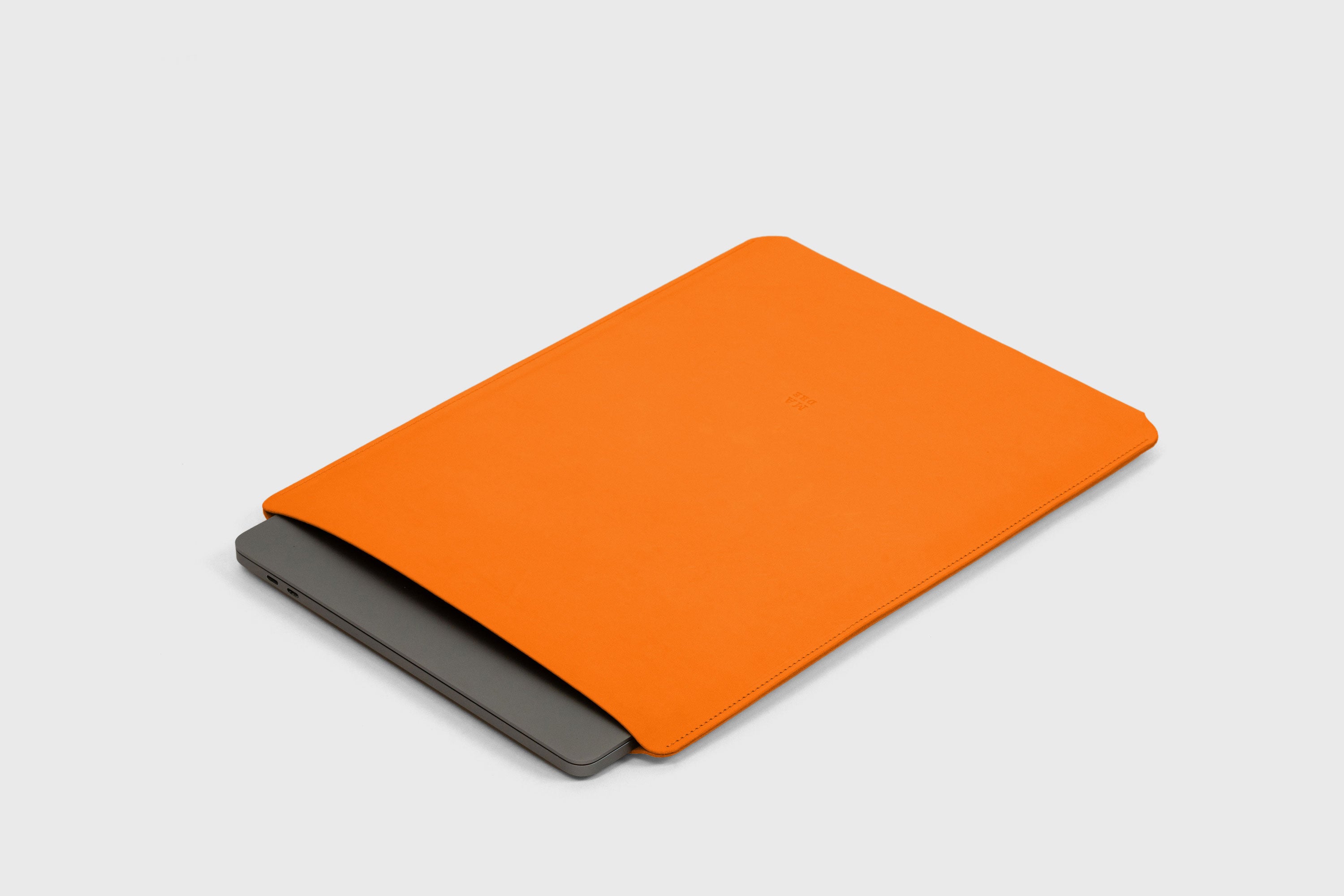 MacBook Air 15 Inch Sleeve Leather Orange Colour Minimalistic Design Premium Quality By Atelier Madre Manuel Dreesmann Atelier Madre Barcelona Spain