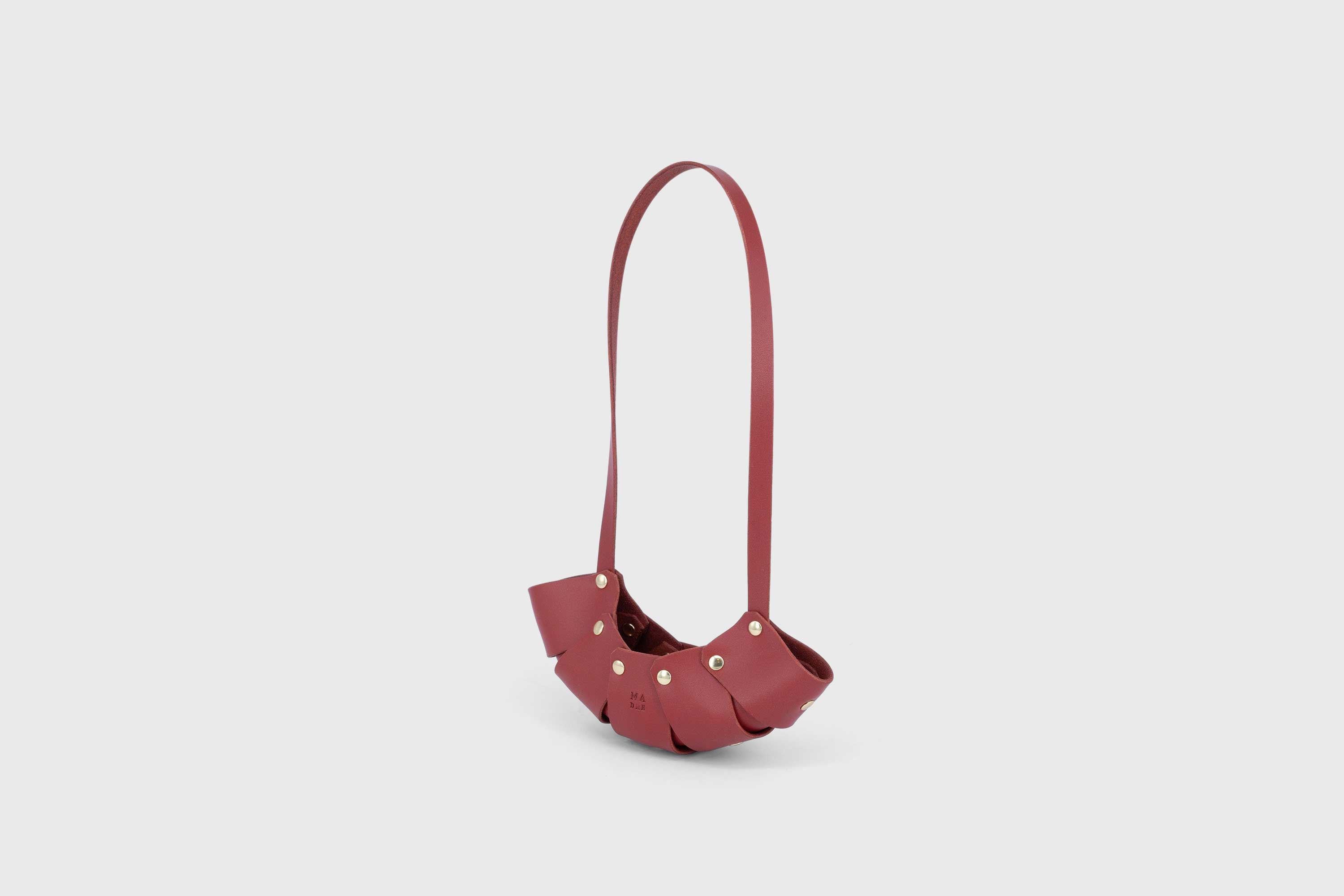 Mako Leather Bag Red Vegetable Tanned Full Grain Spain Brass Rivets Design Minimalist Modern Small Tiny Miniature Bag Pouch Handbag Handmade Atelier Madre Manuel Dreesmann Barcelona