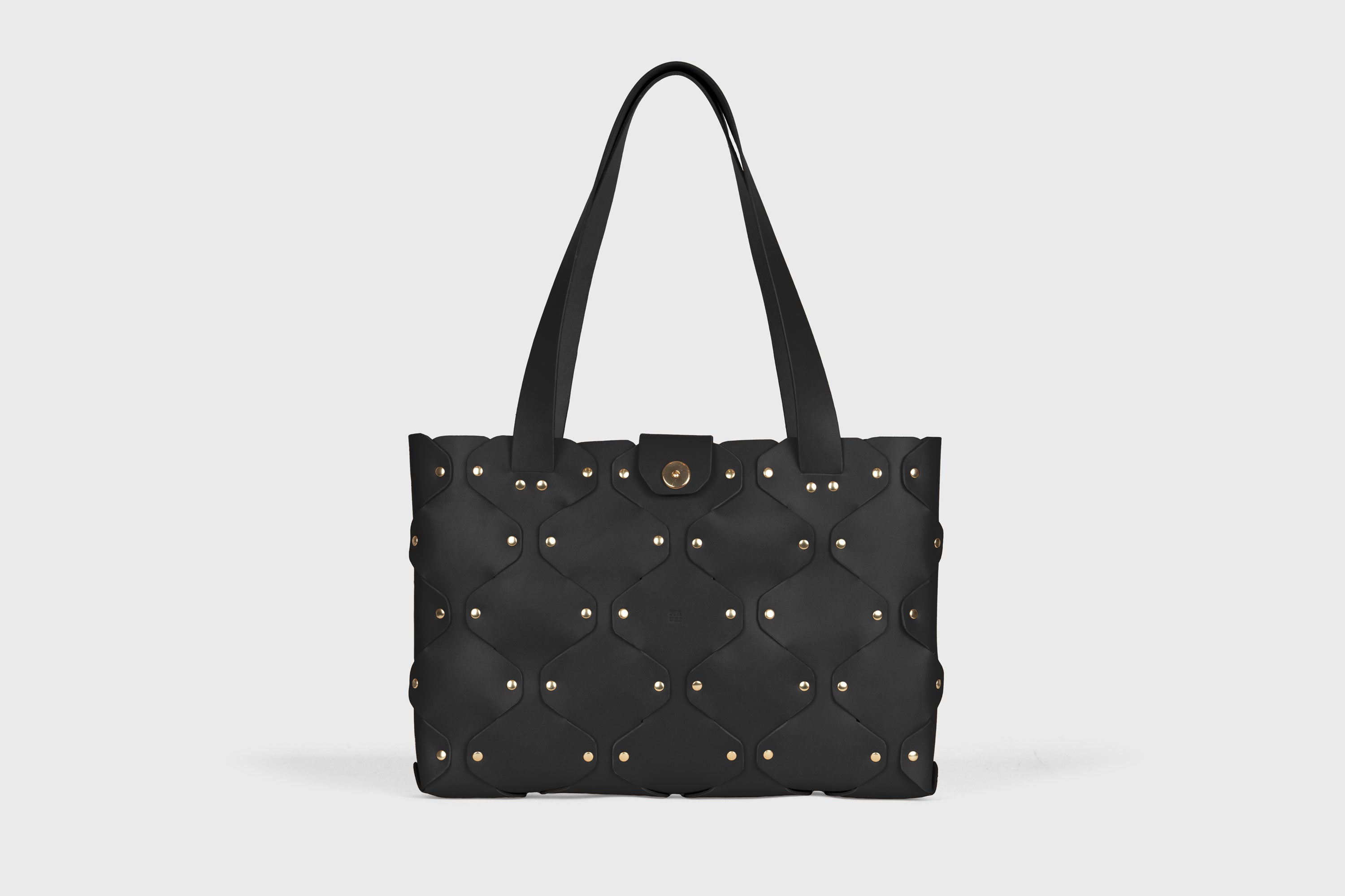 Marlin Tote Bag In Black Color In Vegetable Tanned Leather With Rivets Atelier Madre Manuel Dreesmann Barcelona Spain