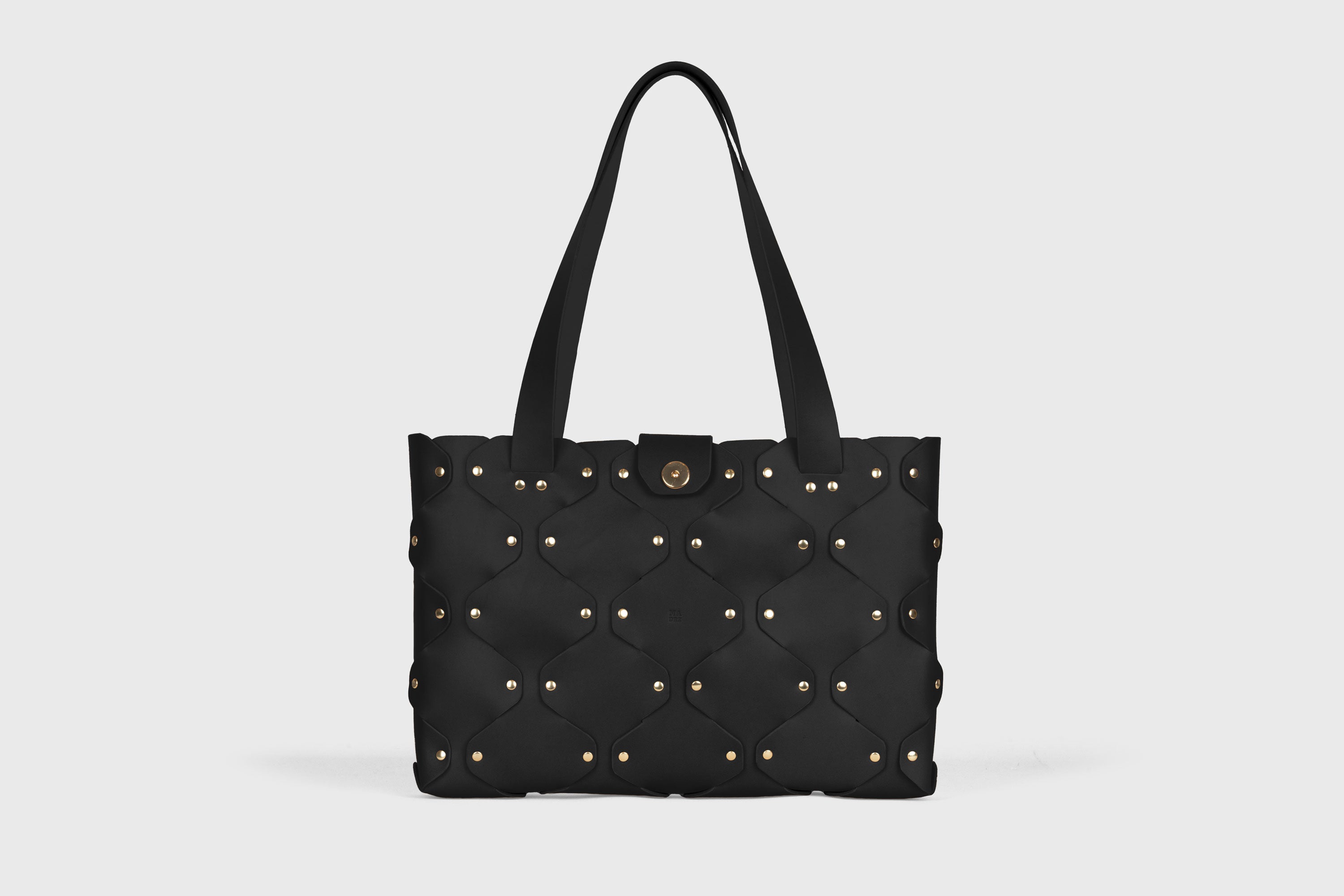 Marlin Tote Bag In Black Color In Vegetable Tanned Leather With Rivets Atelier Madre Manuel Dreesmann Barcelona Spain