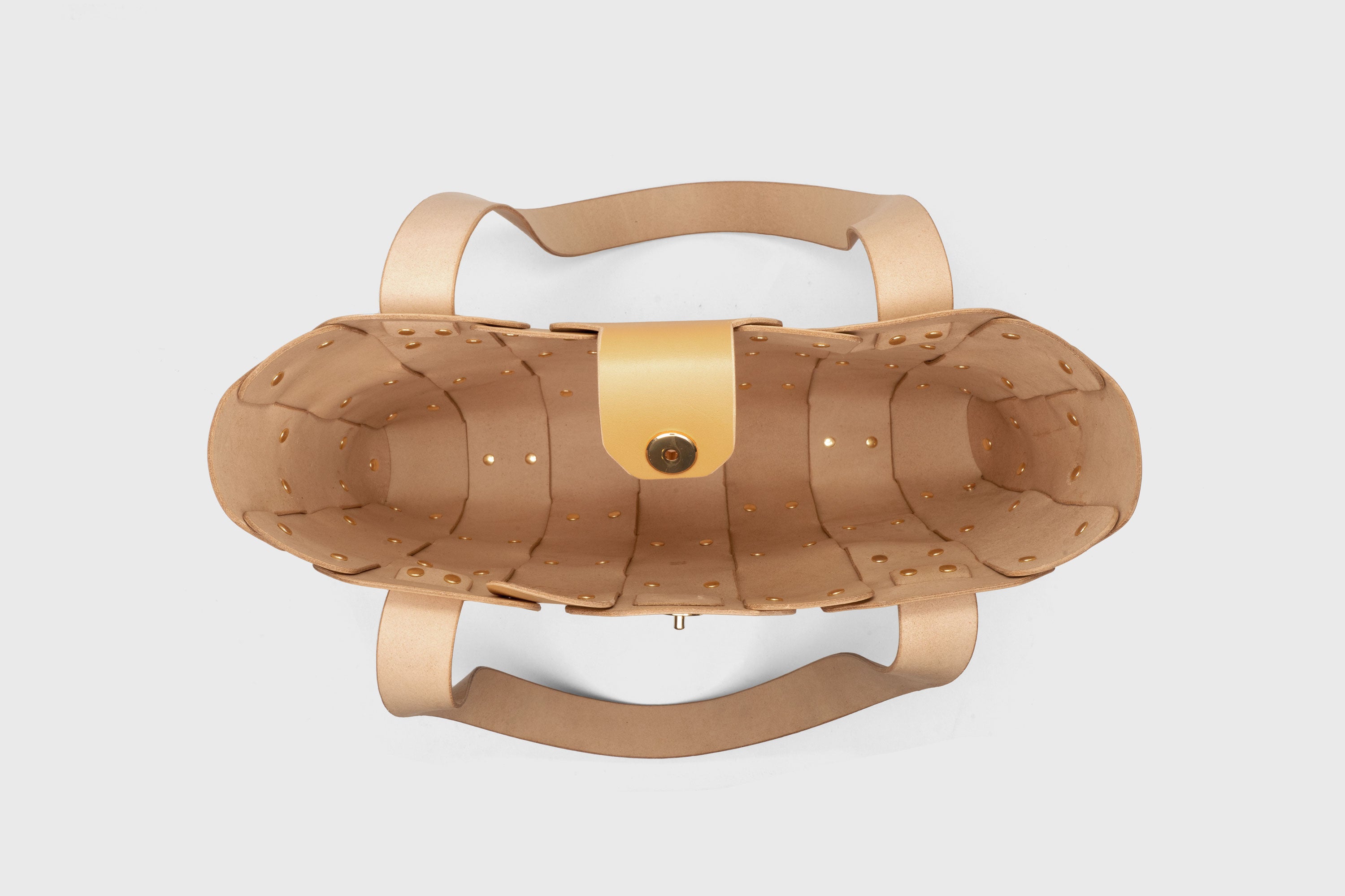 Marlin Tote Bag In Brown Color In Vegetable Tanned Leather With Rivets Atelier Madre Manuel Dreesmann Barcelona Spain