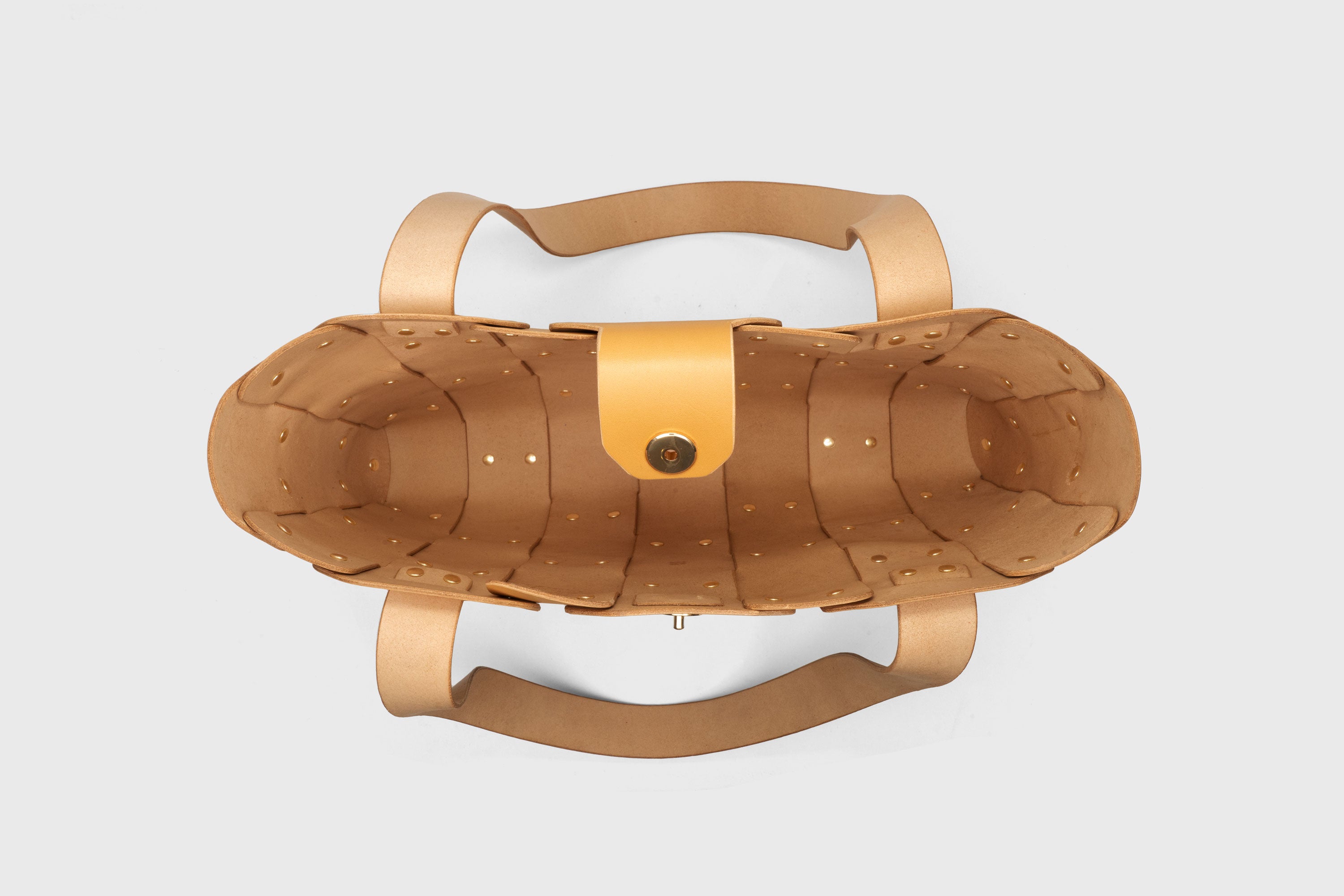 Marlin Tote Bag In Brown Color In Vegetable Tanned Leather With Rivets Atelier Madre Manuel Dreesmann Barcelona Spain