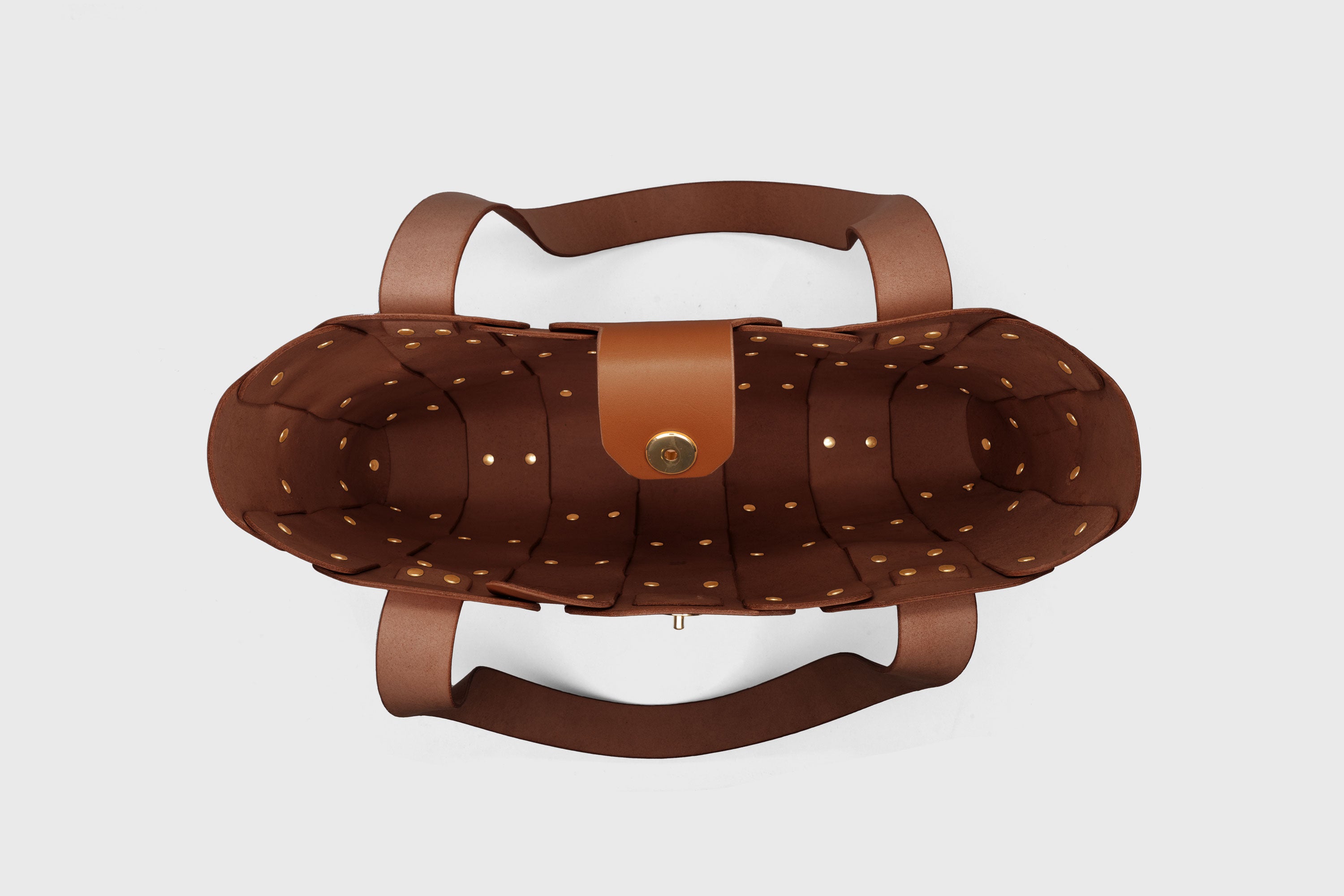 Marlin Tote Bag In Dark Brown Color In Vegetable Tanned Leather With Rivets Atelier Madre Manuel Dreesmann Barcelona Spain