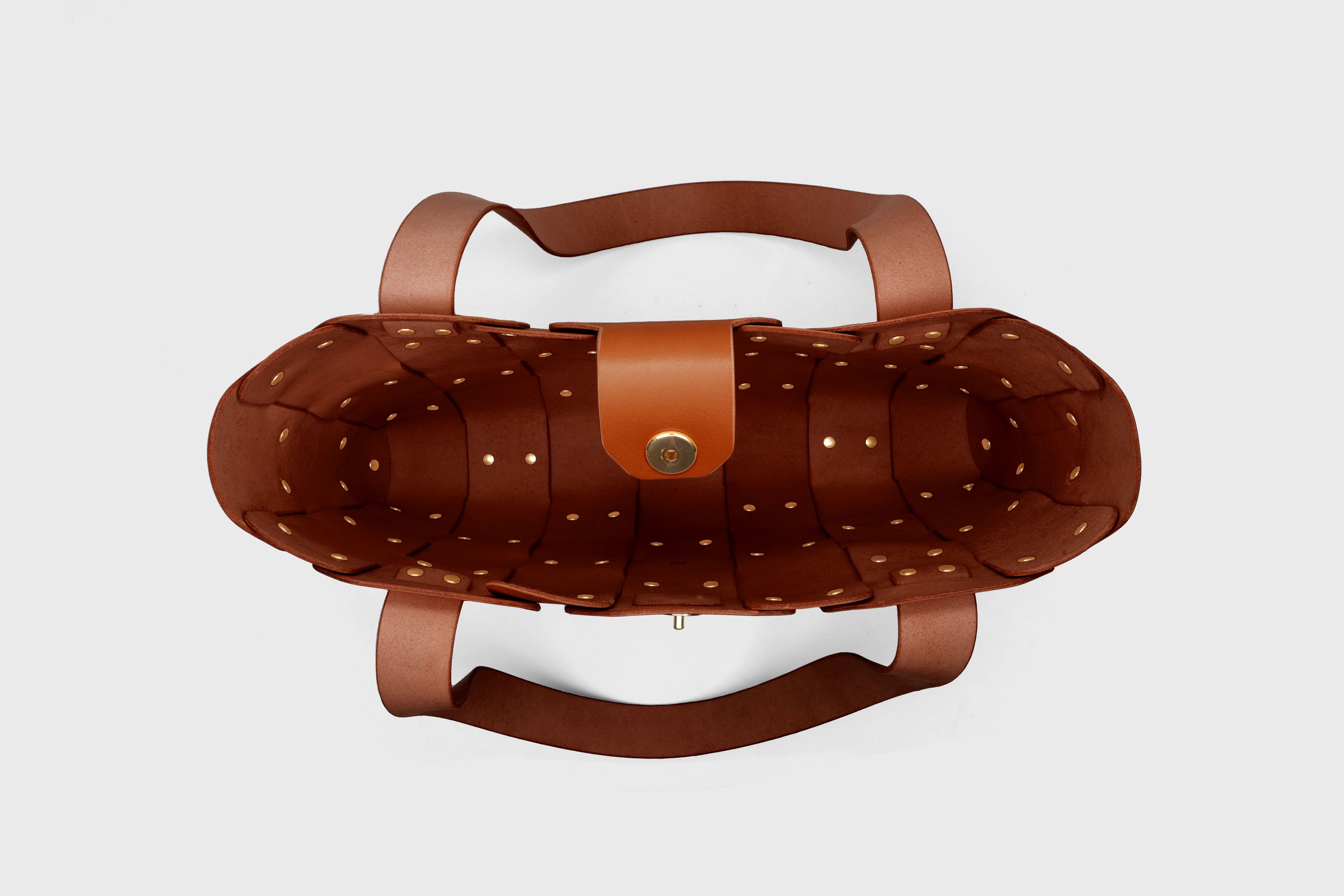 Marlin Tote Bag In Dark Brown Color In Vegetable Tanned Leather With Rivets Atelier Madre Manuel Dreesmann Barcelona Spain