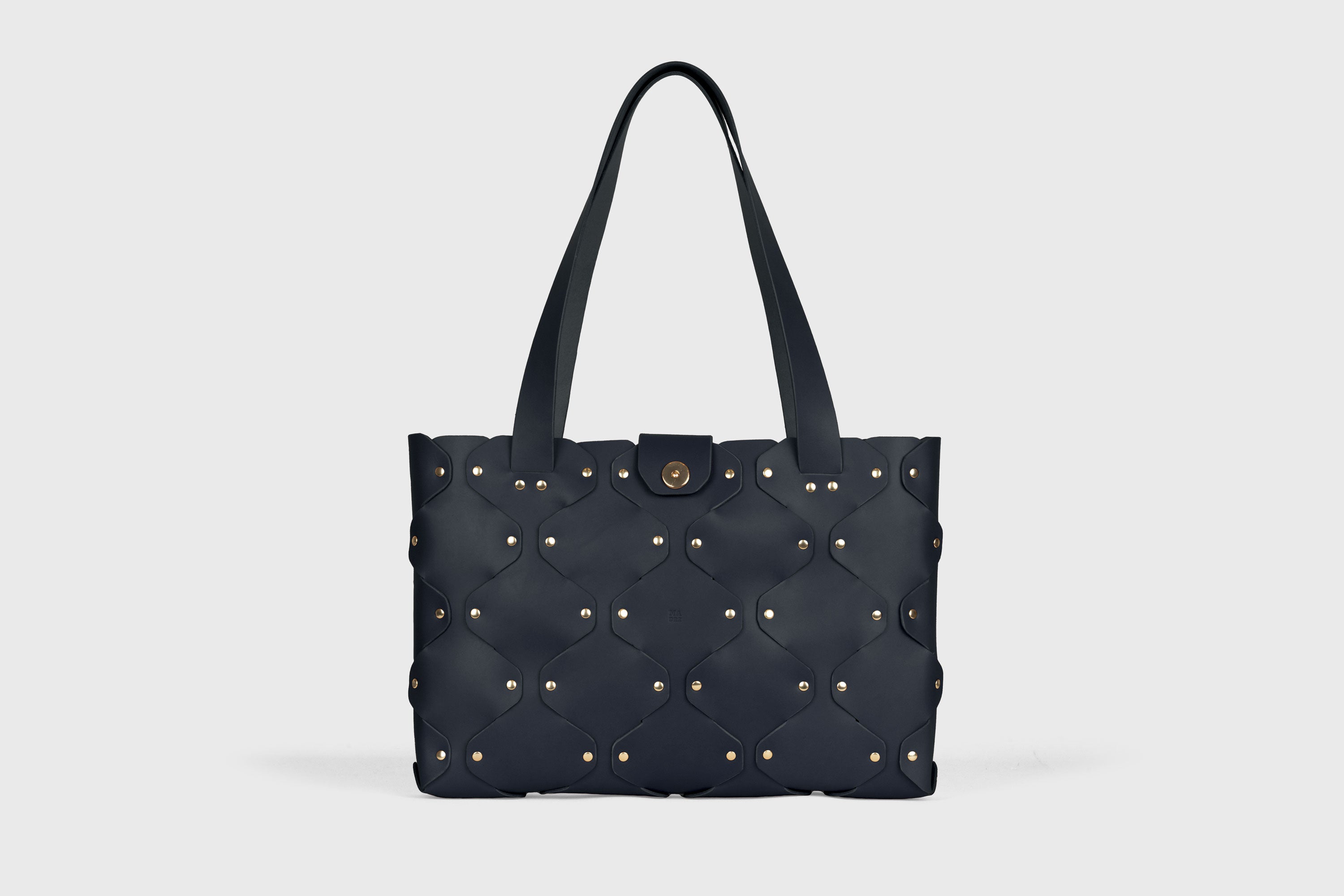 Marlin Tote Bag In Marine Blue Color In Vegetable Tanned Leather With Rivets Atelier Madre Manuel Dreesmann Barcelona Spain