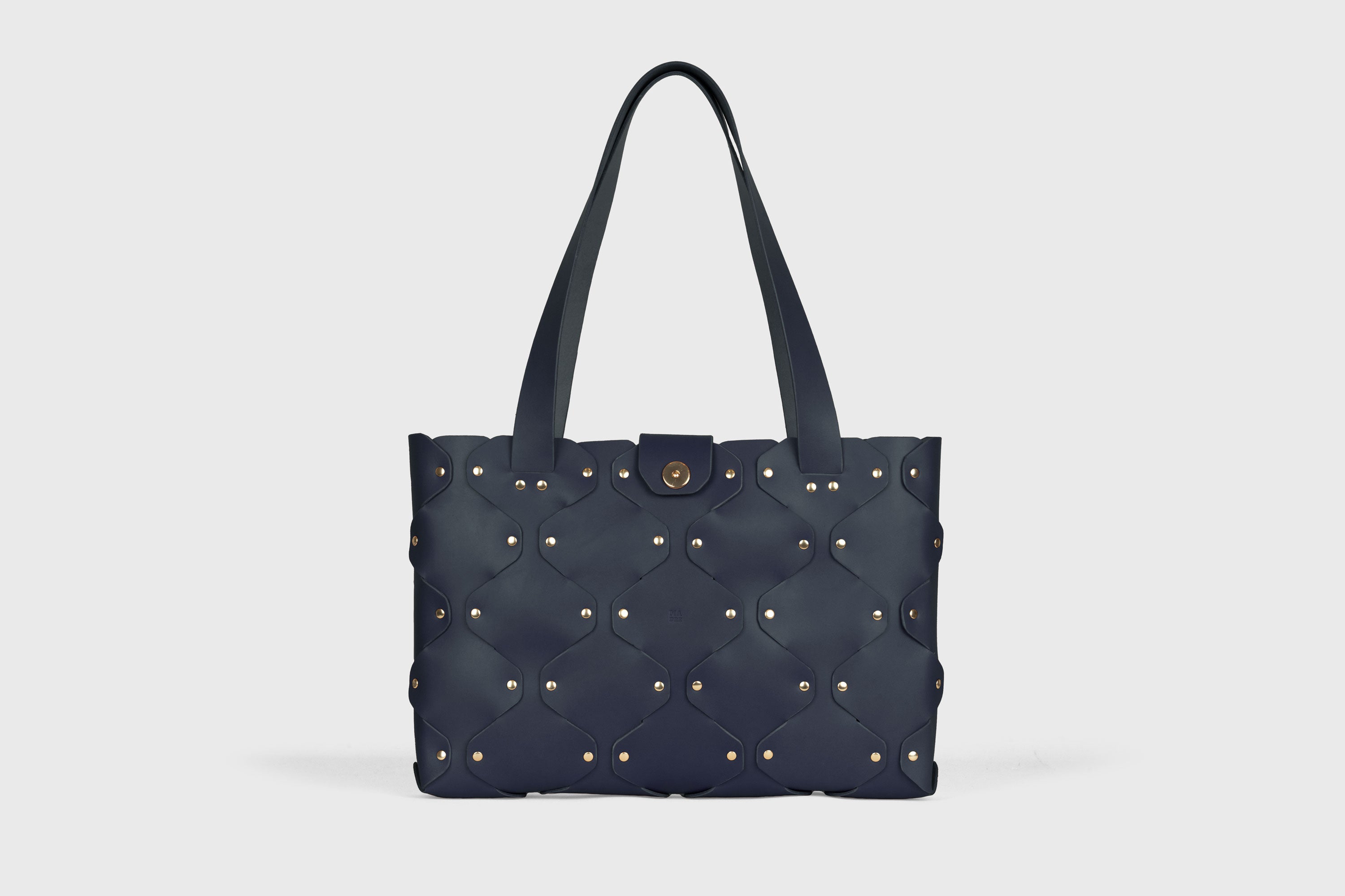 Marlin Tote Bag In Marine Blue Color In Vegetable Tanned Leather With Rivets Atelier Madre Manuel Dreesmann Barcelona Spain