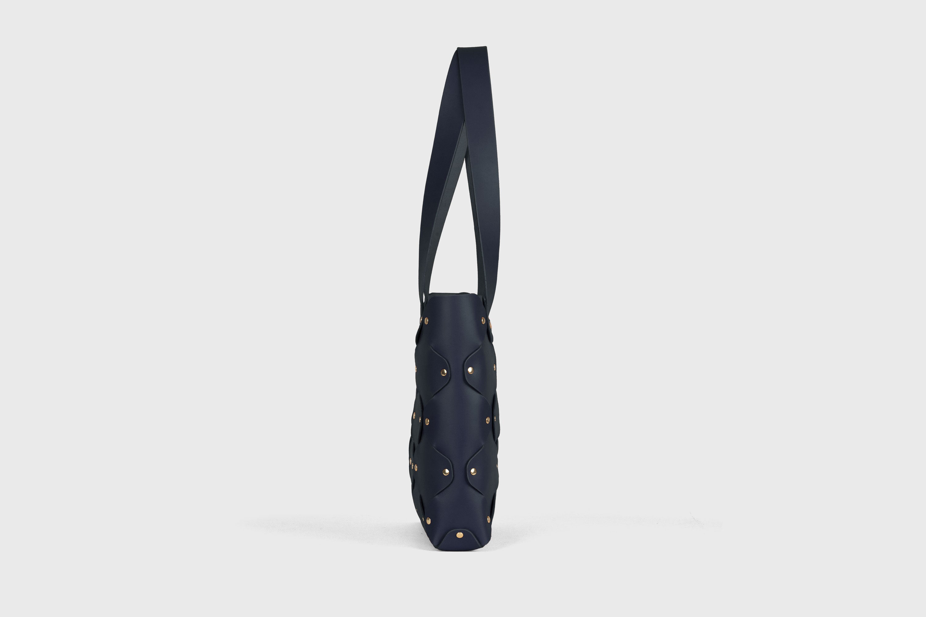 Marlin Tote Bag In Marine Blue Color In Vegetable Tanned Leather With Rivets Atelier Madre Manuel Dreesmann Barcelona Spain