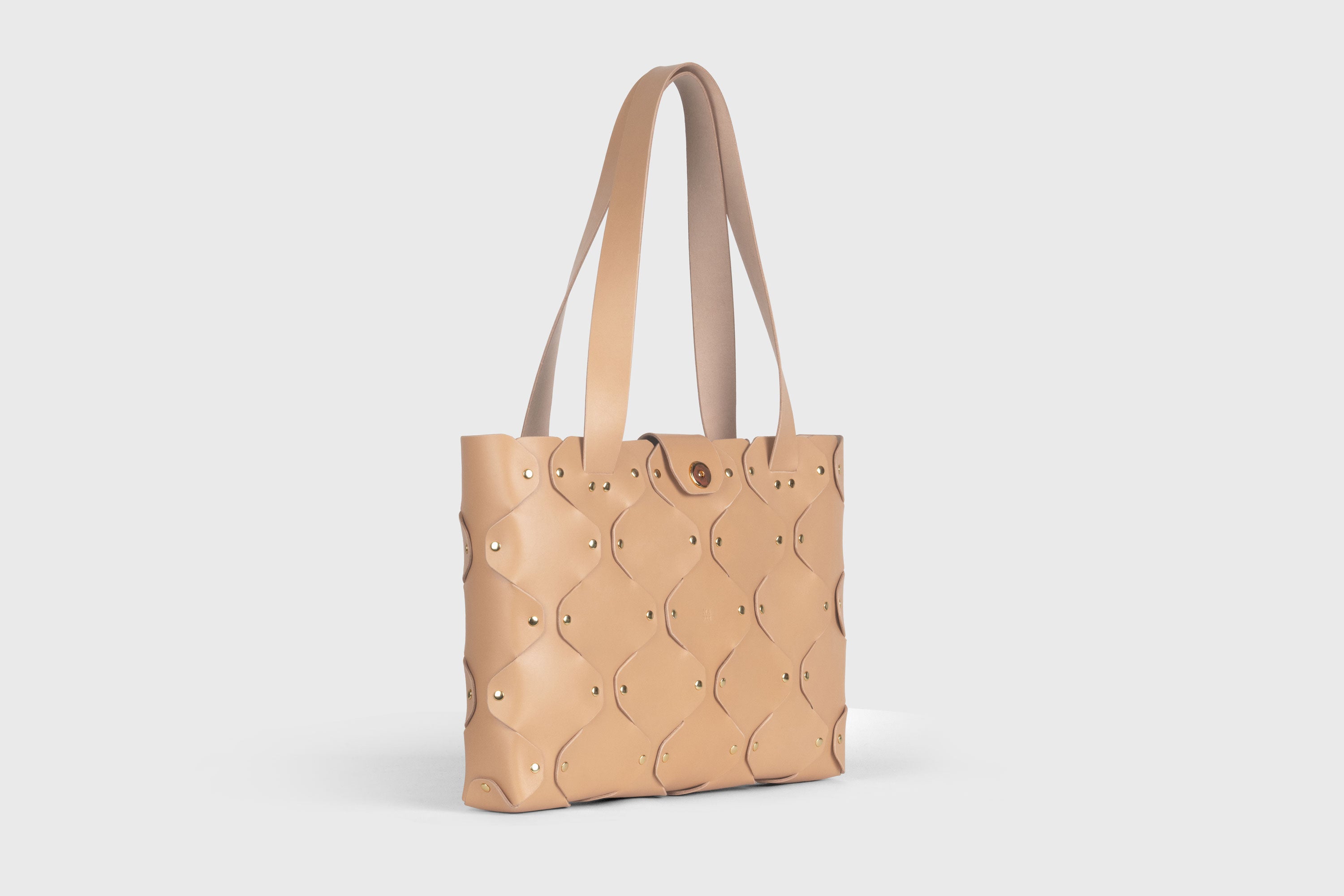 Marlin Tote Bag In Natural Color In Vegetable Tanned Leather With Rivets Atelier Madre Manuel Dreesmann Barcelona Spain