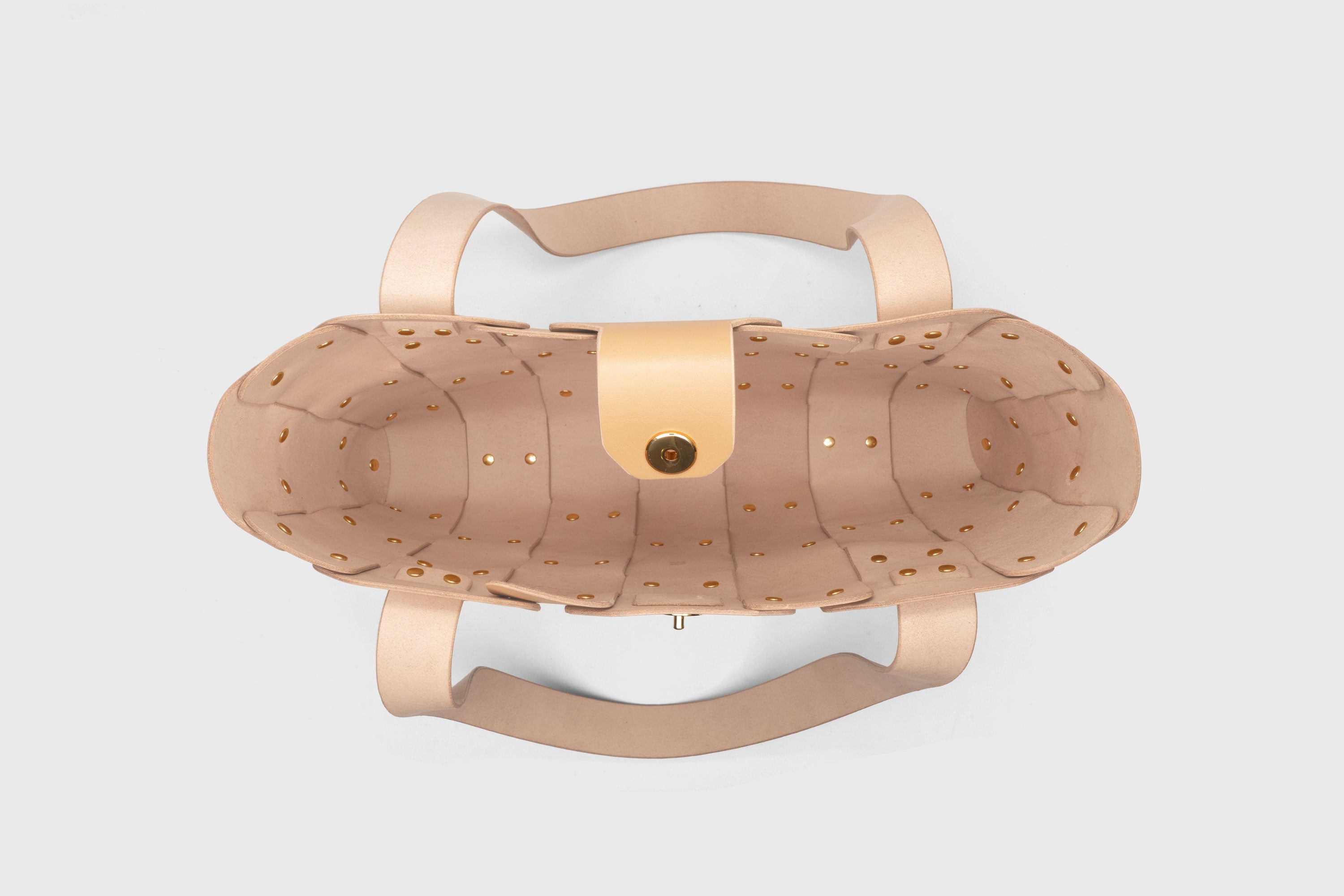 Marlin Tote Bag In Natural Color In Vegetable Tanned Leather With Rivets Atelier Madre Manuel Dreesmann Barcelona Spain