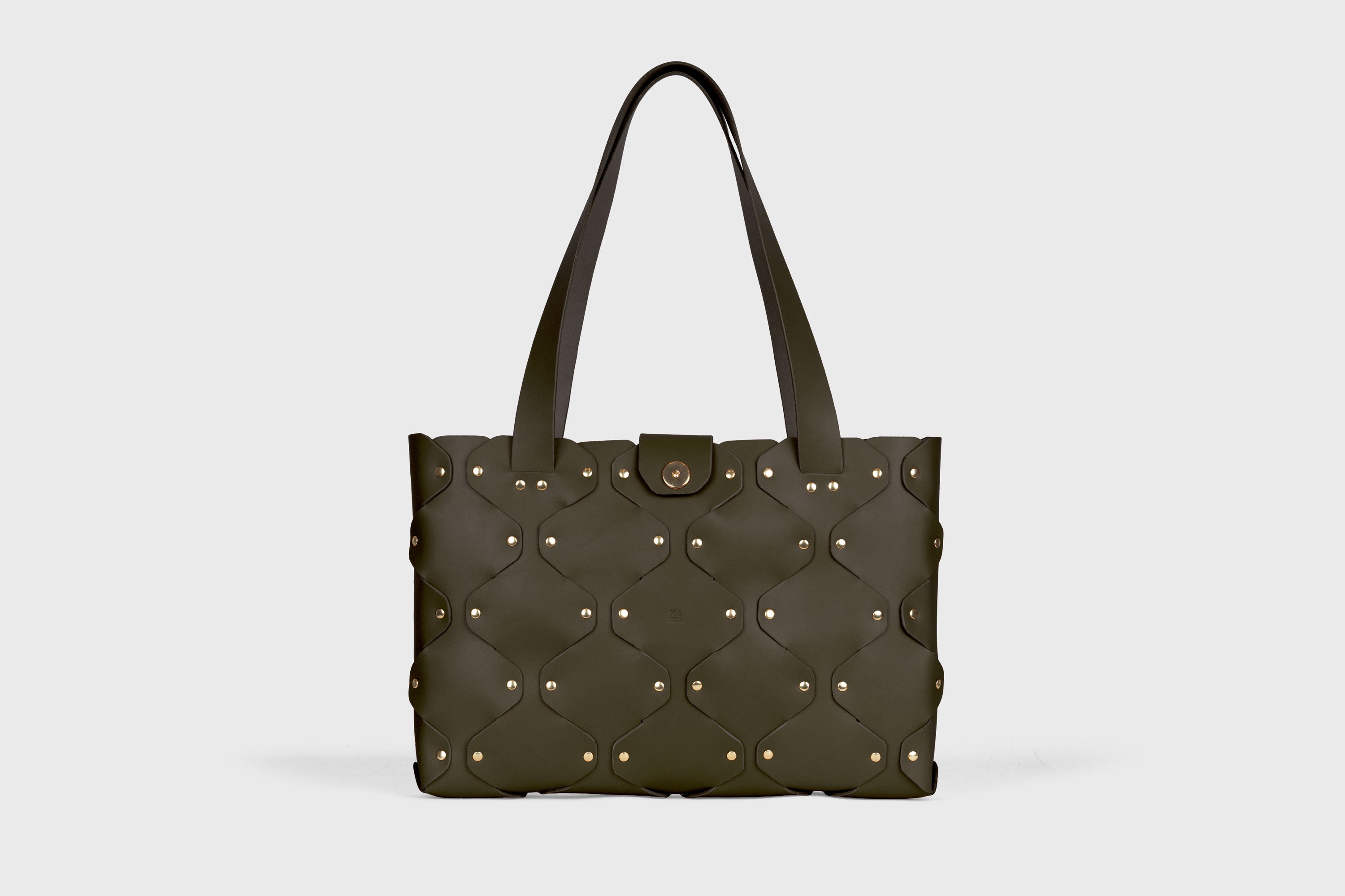 Marlin Tote Bag In Olive Green Color In Vegetable Tanned Leather With Rivets Atelier Madre Manuel Dreesmann Barcelona Spain