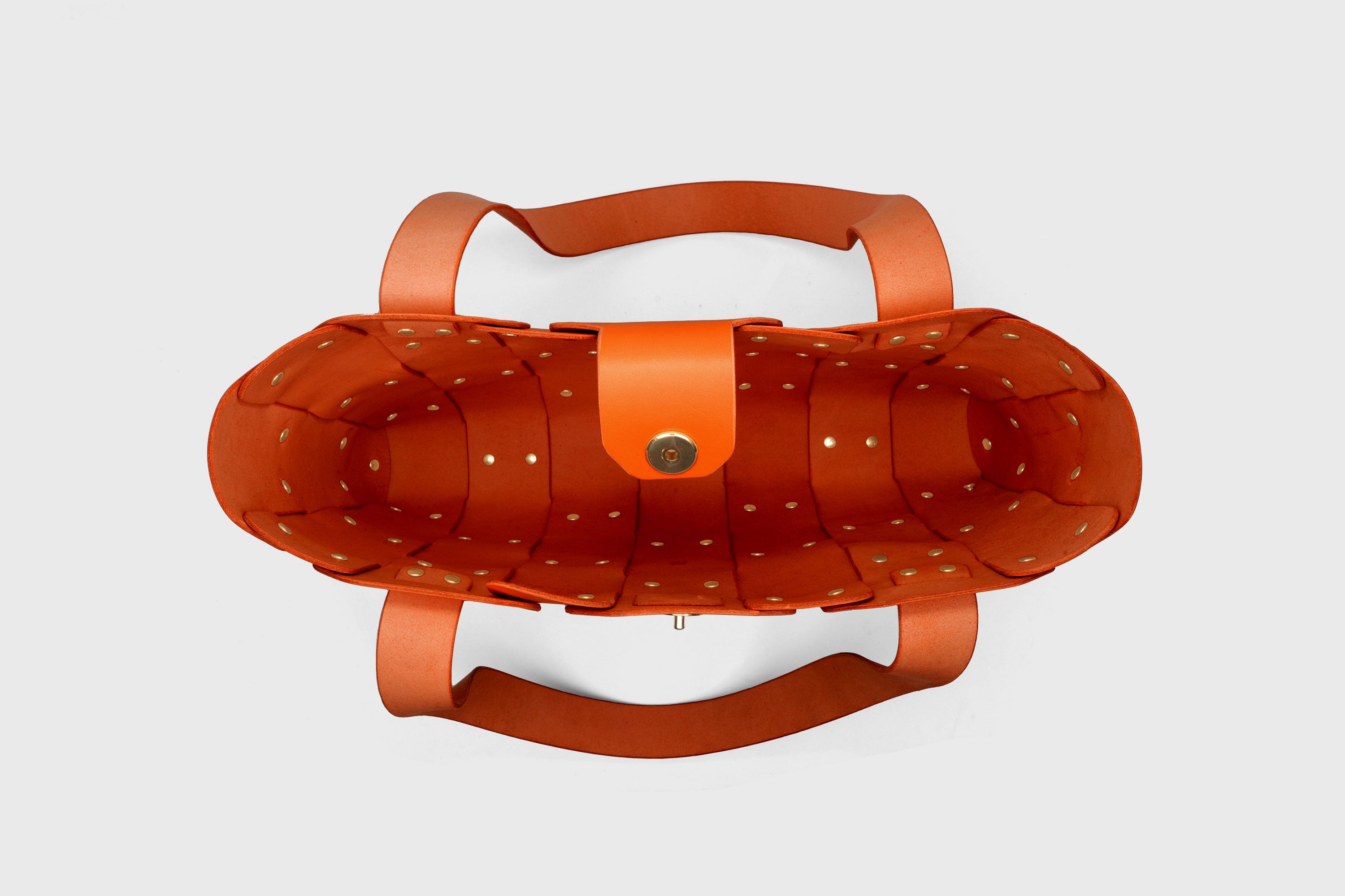 Marlin Tote Bag In Orange Color In Vegetable Tanned Leather With Rivets Atelier Madre Manuel Dreesmann Barcelona Spain