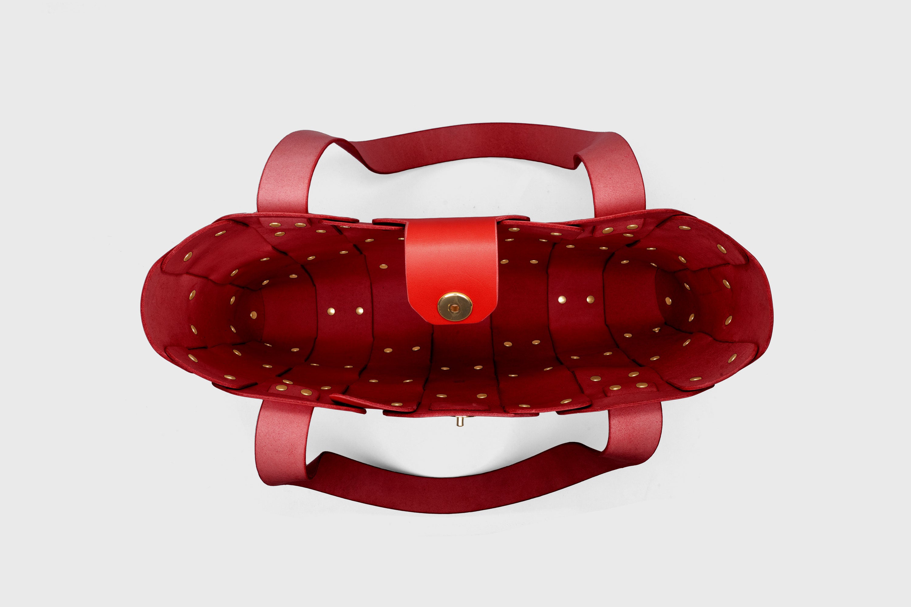 Marlin Tote Bag In Red Color In Vegetable Tanned Leather With Rivets Atelier Madre Manuel Dreesmann Barcelona Spain