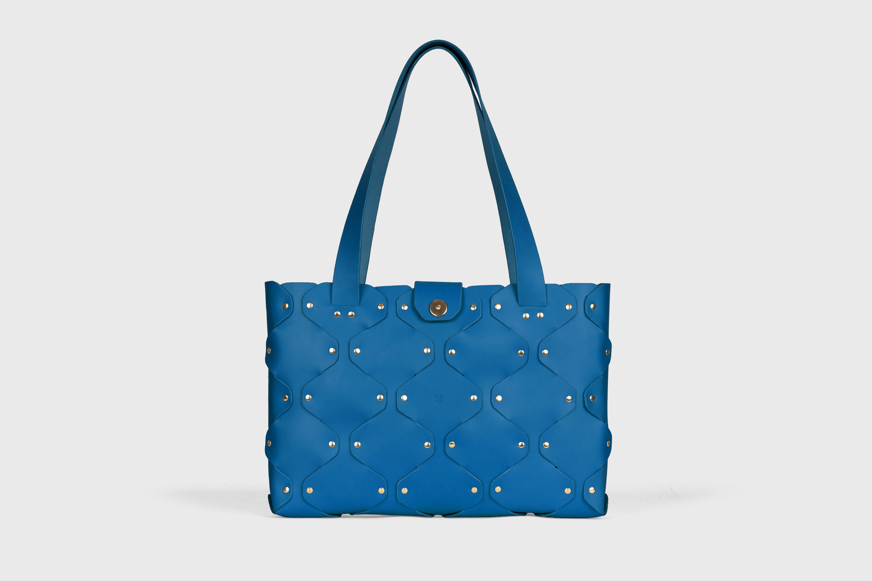 Marlin Tote Bag In Royal Blue Color In Vegetable Tanned Leather With Rivets Atelier Madre Manuel Dreesmann Barcelona Spain