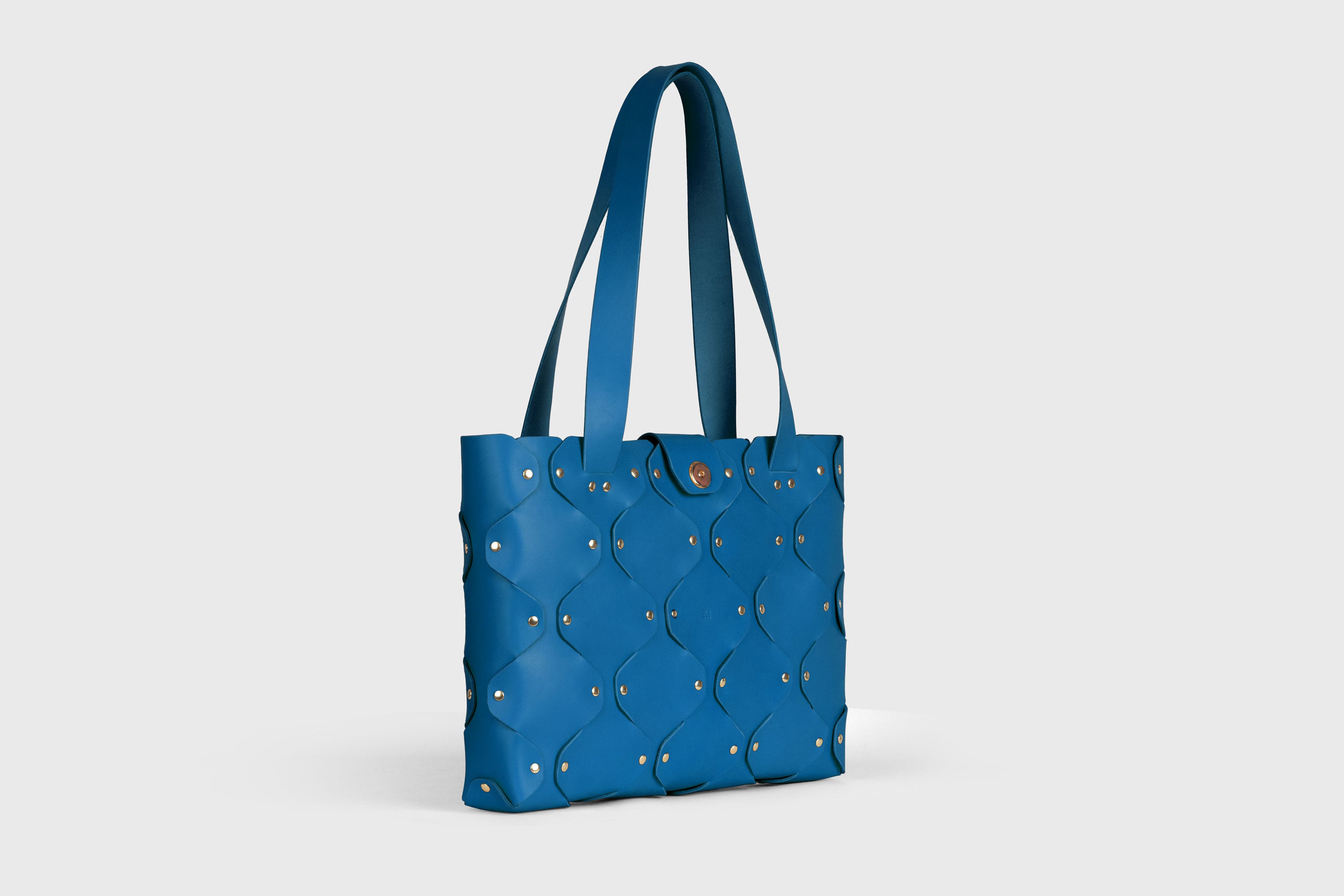 Marlin Tote Bag In Royal Blue Color In Vegetable Tanned Leather With Rivets Atelier Madre Manuel Dreesmann Barcelona Spain