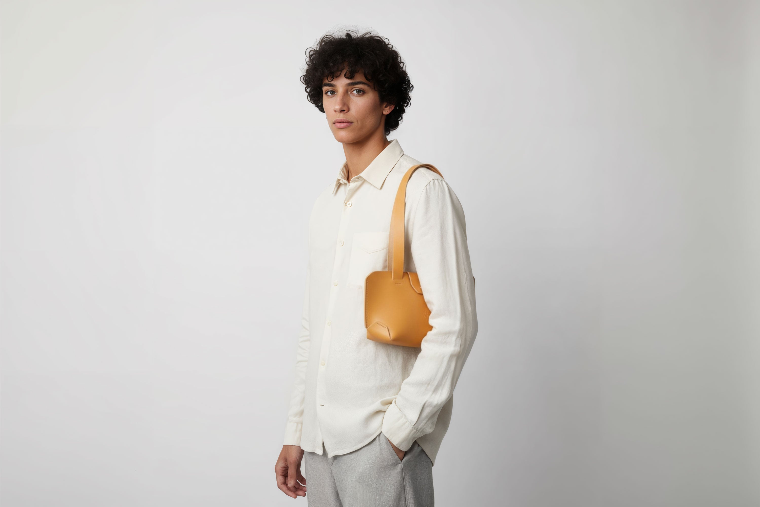 Medium Tote Bag Brown Color On Man Model Leather Premium Quality Minimalist Modern Design Atelier Madre Manuel Dreesmann Barcelona Spain