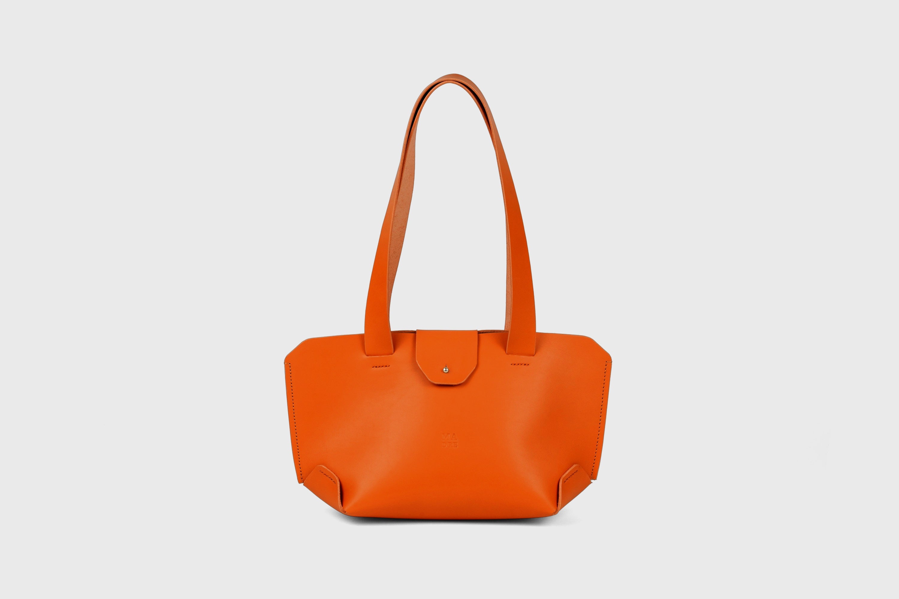 Medium Tote Bag With Flap In Orange In Vegetable Tanned Leather Minimalistic Design Atelier Madre Manuel Dreesmann Barcelona Spain
