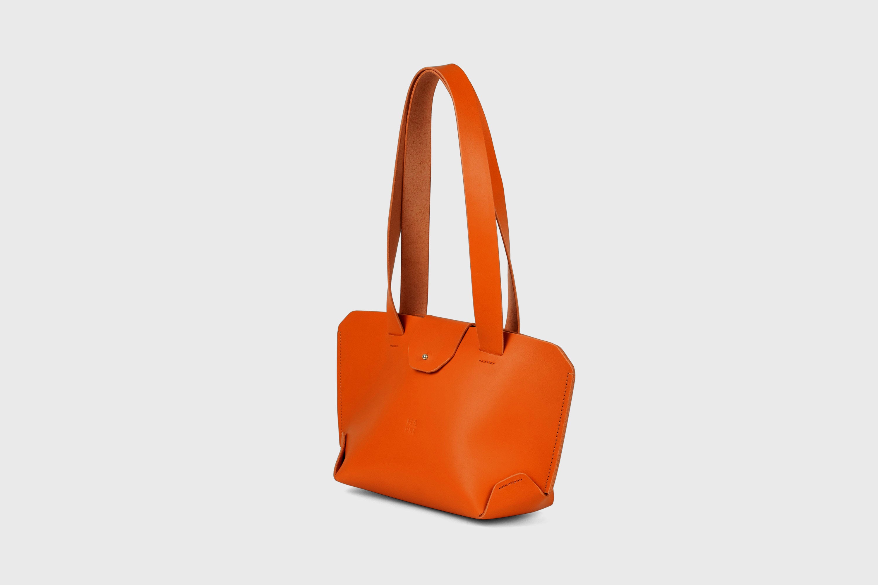 Medium Tote Bag With Flap In Orange In Vegetable Tanned Leather Minimalistic Design Atelier Madre Manuel Dreesmann Barcelona Spain