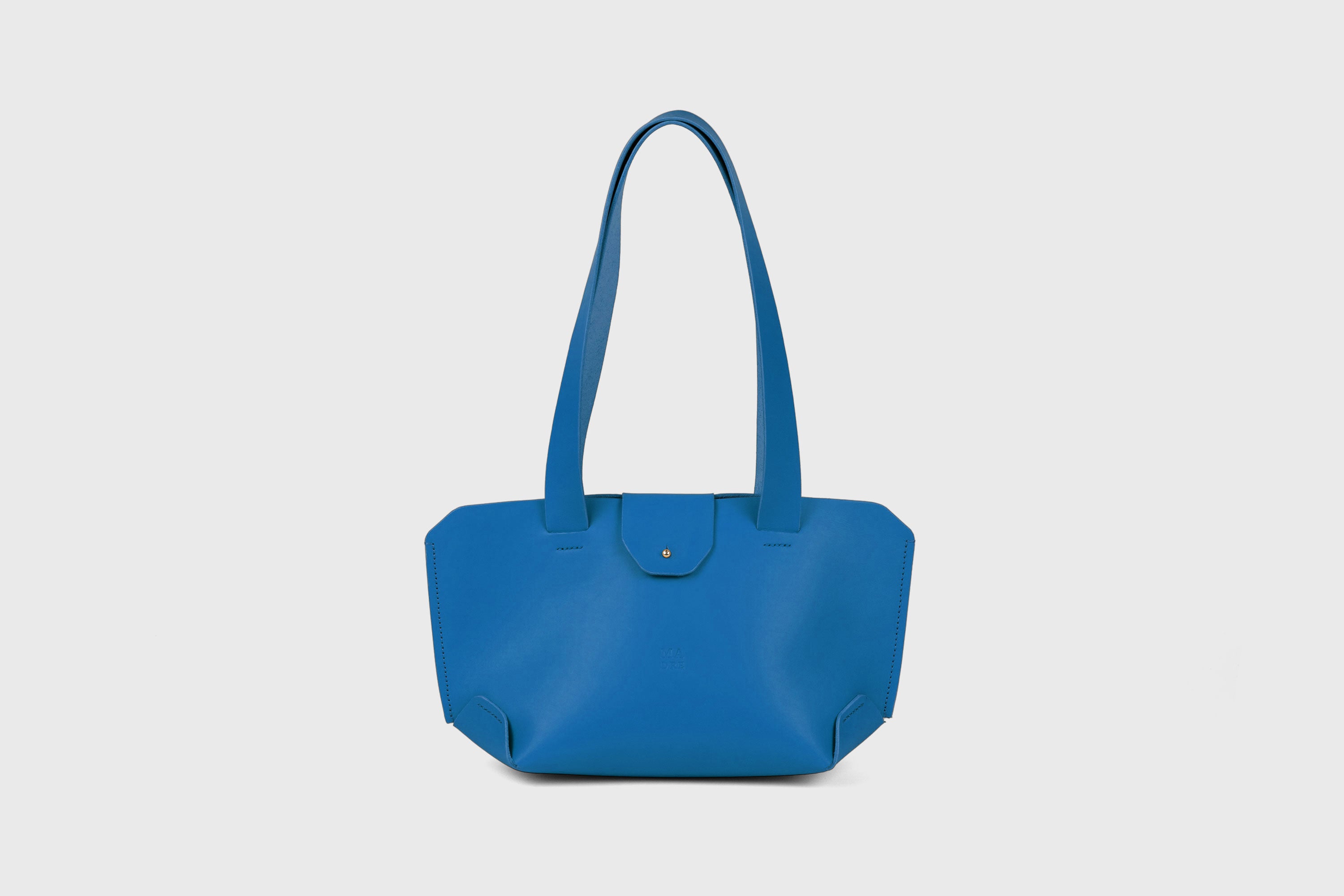 Medium Tote Bag With Flap In Royal Blue In Vegetable Tanned Leather Minimalistic Design Atelier Madre Manuel Dreesmann Barcelona Spain