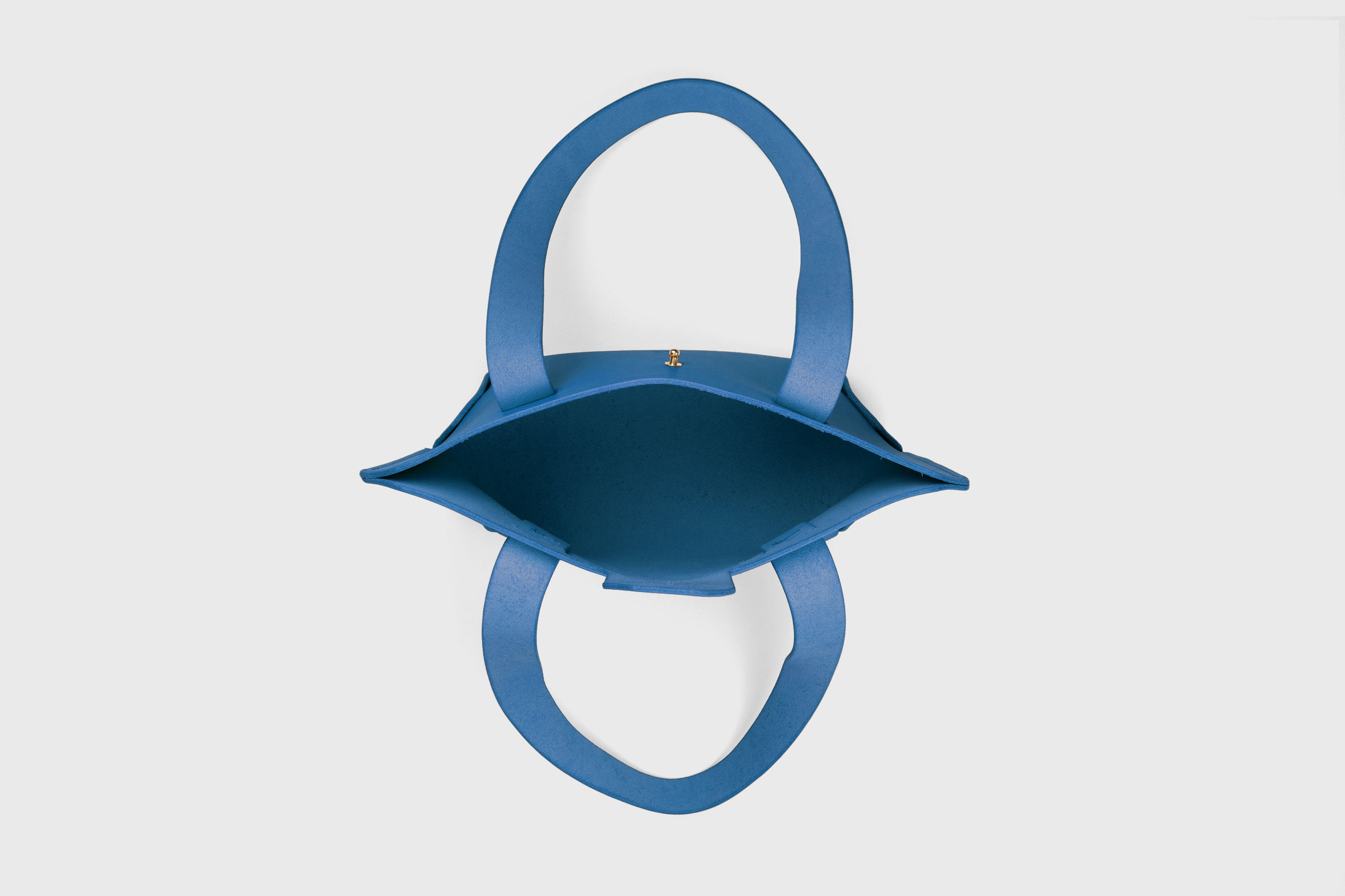 Medium Tote Bag With Flap In Royal Blue In Vegetable Tanned Leather Minimalistic Design Atelier Madre Manuel Dreesmann Barcelona Spain