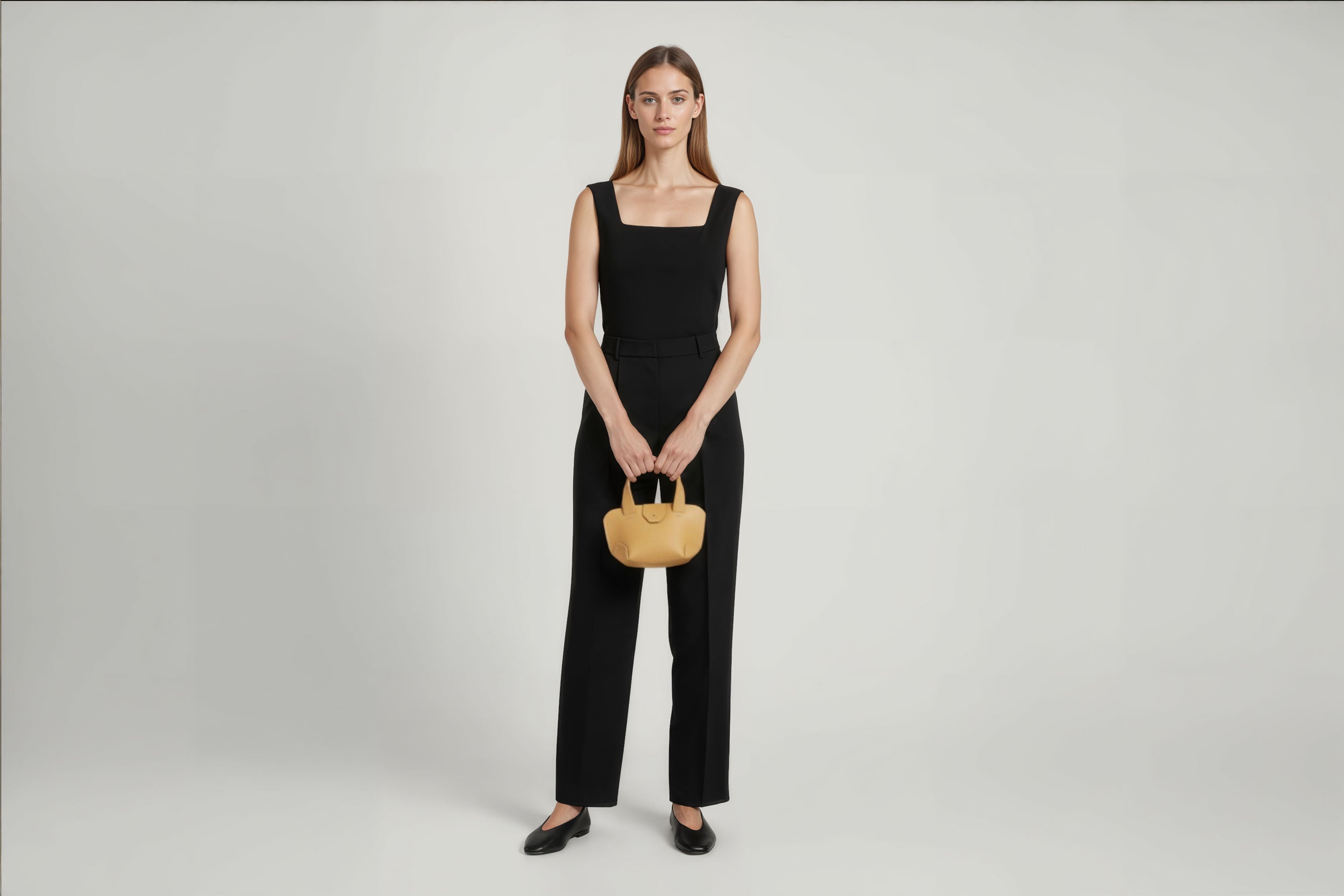 Mini Tote Bag Brown Color Leather On A Woman Model Handbag Small Modern Minimalist Design Premium Quality Atelier Madre Manuel Dreesmann Barcelona Spain