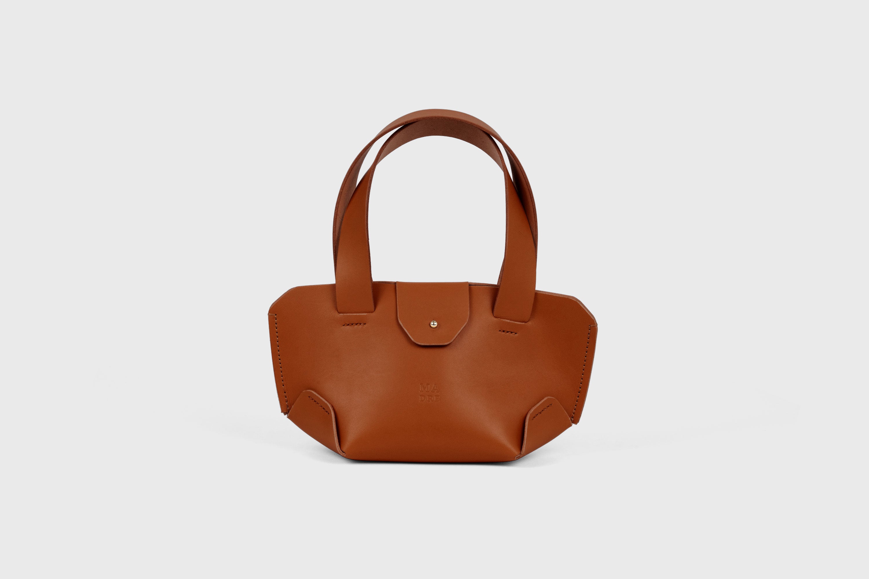 Mini Tote Bag In Dark Brown Color In Vegetable Tanned Leather Bag With A Flap In Minimalistic Design Atelier Madre Manuel Dreesmann 