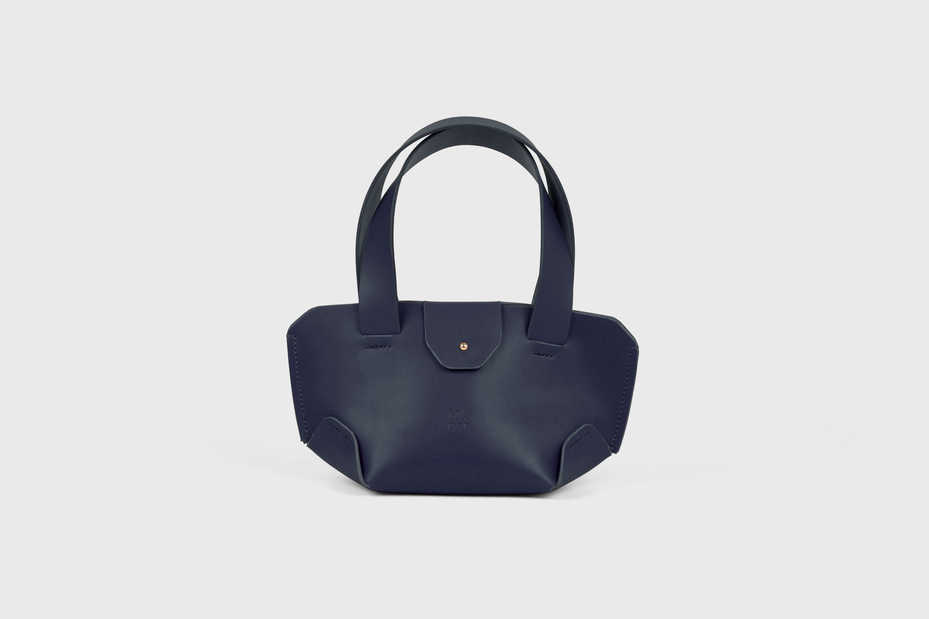 Mini Tote Bag In Marine Blue Color In Vegetable Tanned Leather Bag With A Flap In Minimalistic Design Atelier Madre Manuel Dreesmann 