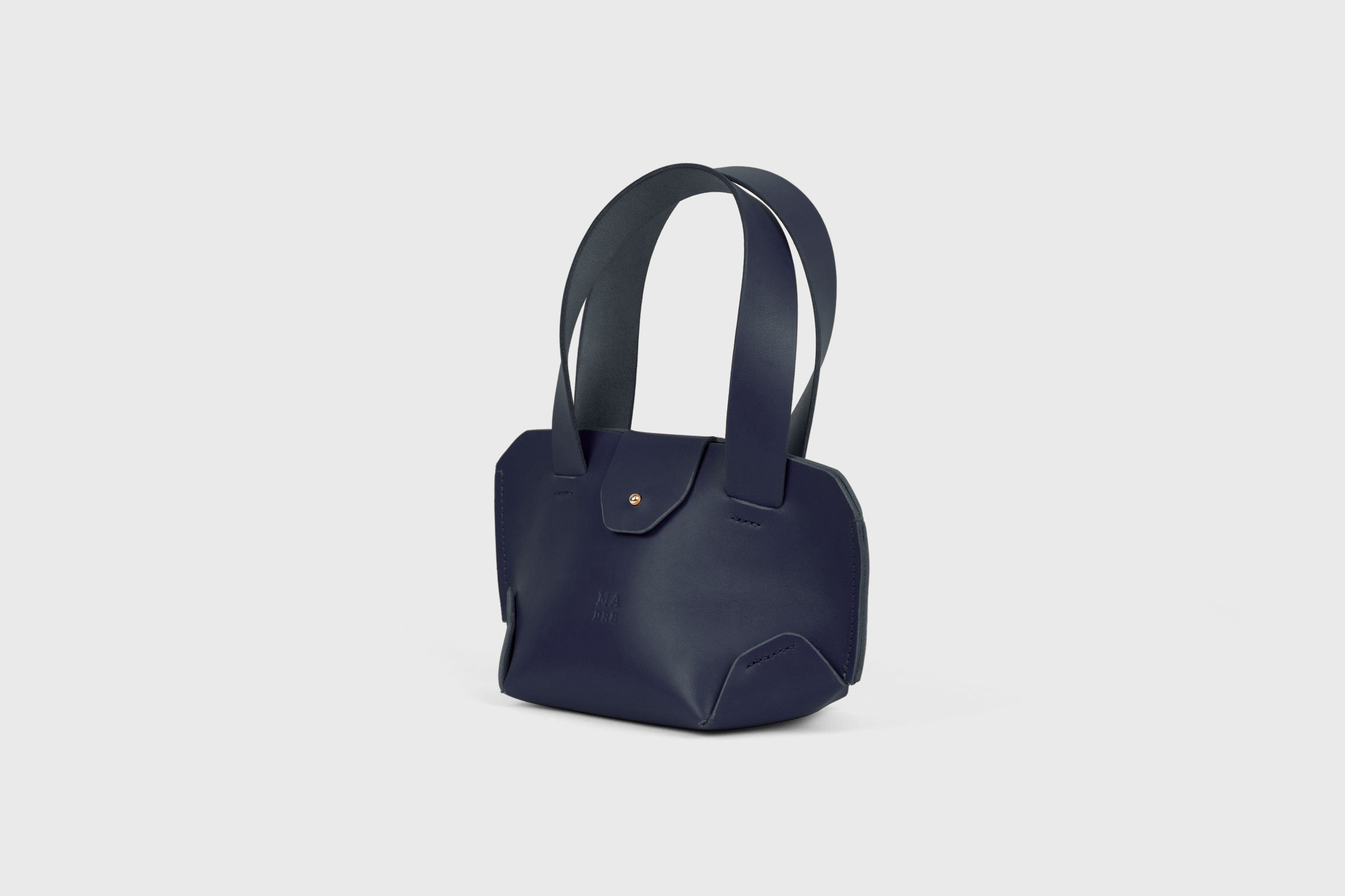 Mini Tote Bag In Marine Blue Color In Vegetable Tanned Leather Bag With A Flap In Minimalistic Design Atelier Madre Manuel Dreesmann 
