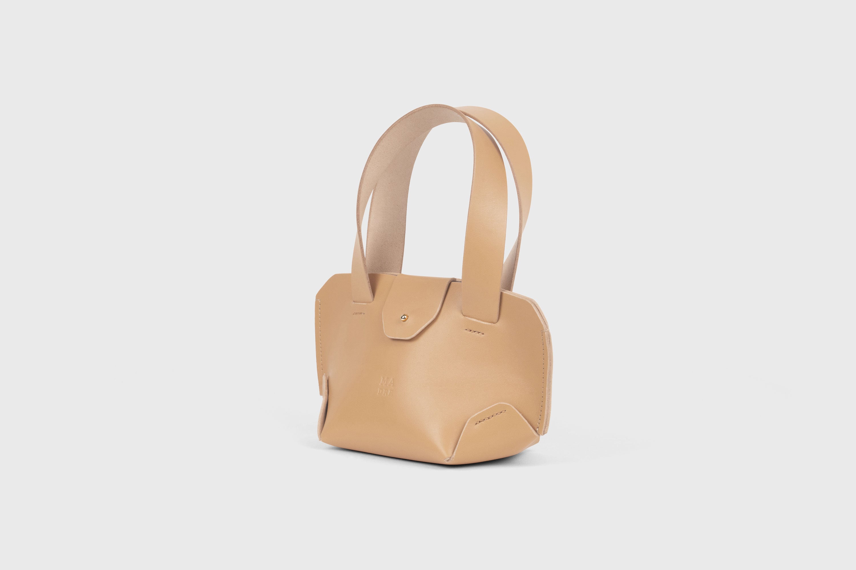 Mini Tote Bag In Natural Color In Vegetable Tanned Leather Bag With A Flap In Minimalistic Design Atelier Madre Manuel Dreesmann 