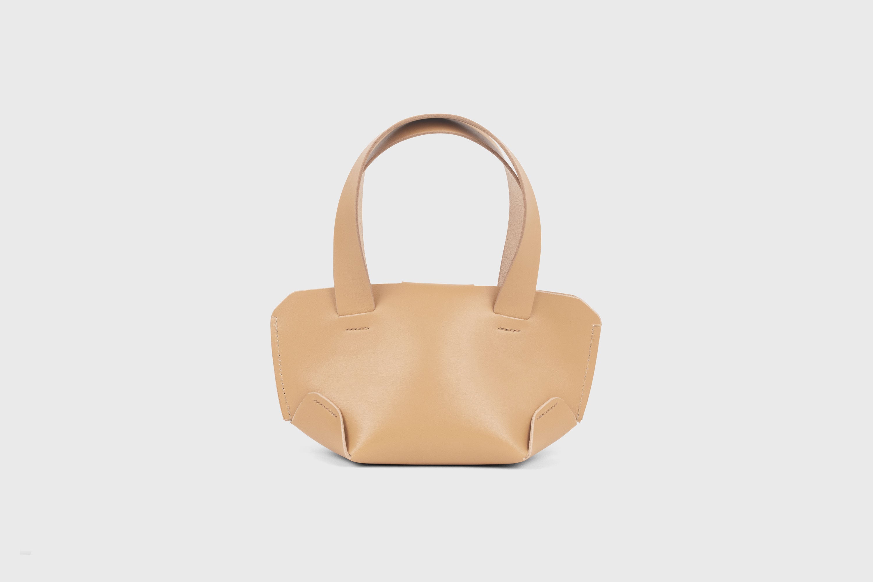 Mini Tote Bag In Natural Color In Vegetable Tanned Leather Bag With A Flap In Minimalistic Design Atelier Madre Manuel Dreesmann 