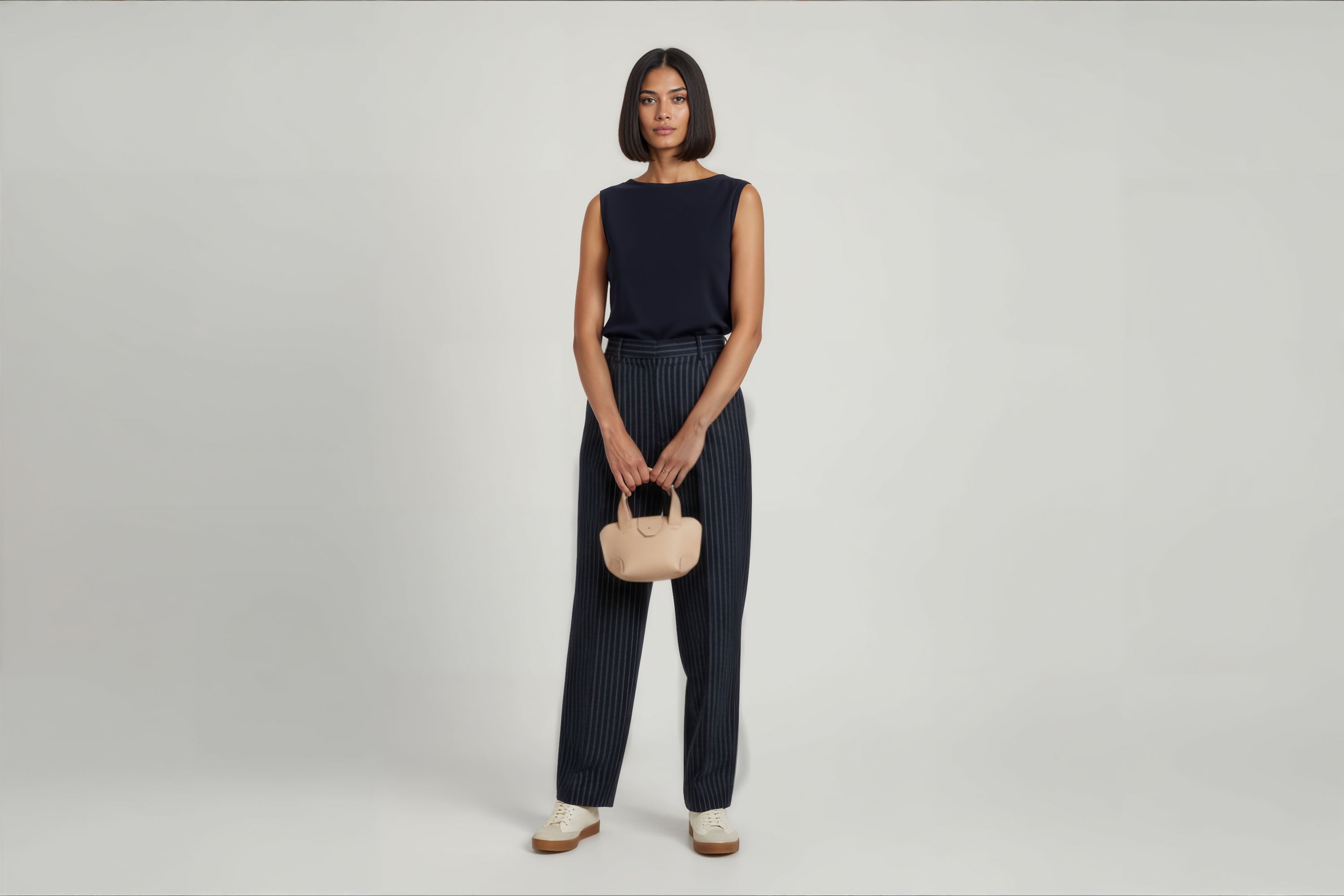 Mini Tote Bag Natural Colour Leather On A Woman Model Handbag Small Modern Minimalist Design Premium Quality Atelier Madre Manuel Dreesmann Barcelona Spain