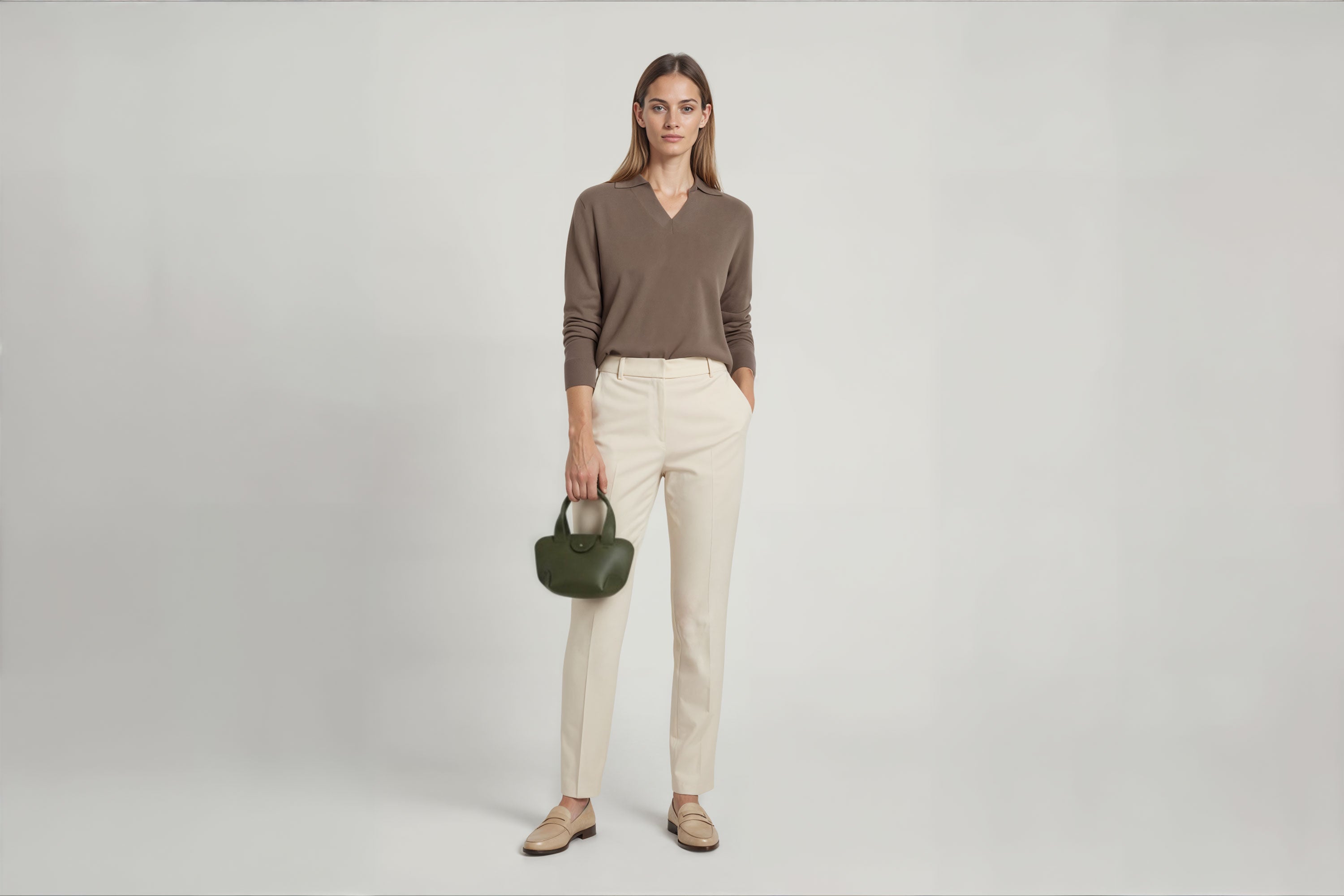 Mini Tote Bag Olive Green Leather On A Woman Model Handbag Small Modern Minimalist Design Premium Quality Atelier Madre Manuel Dreesmann Barcelona Spain