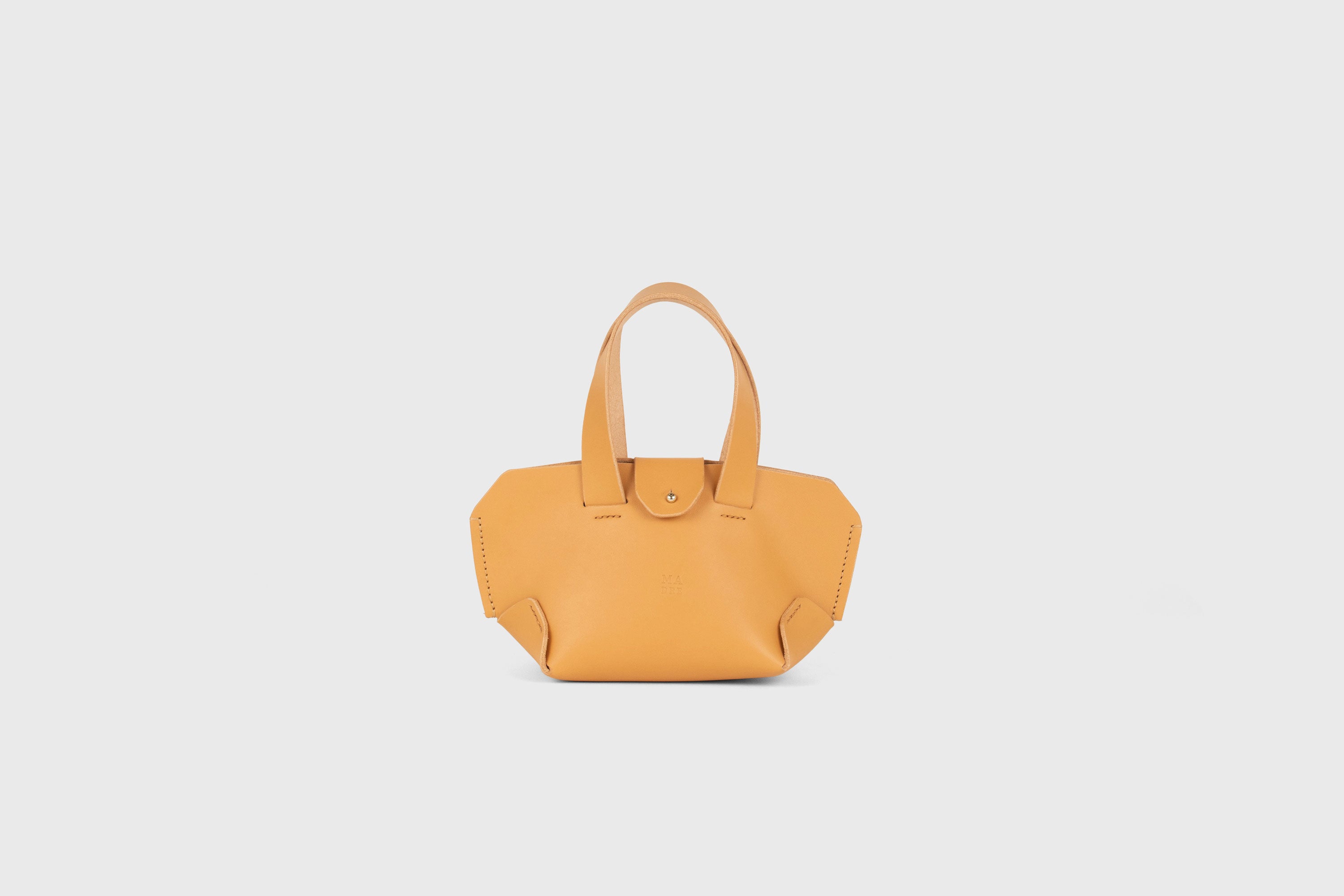 Nano Tote Bag In Brown Color In Vegetable Tanned Leather Minimalistic Design Atelier Madre Manuel Dreesmann Barcelona Spain