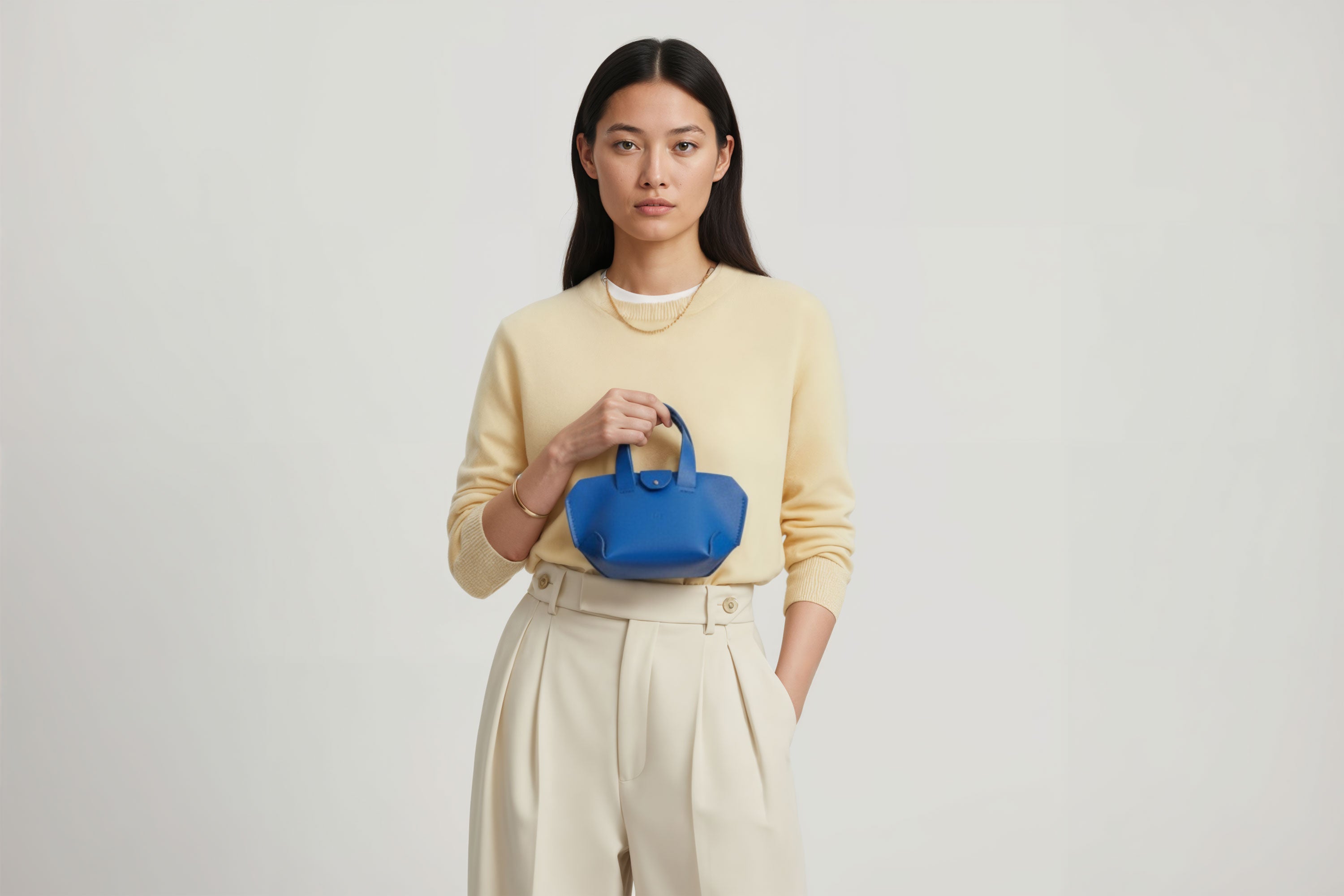 Nano Leather Tote Bag Royal Blue Color On A Woman Model Premium Quality Minimalist Design Atelier Madre Manuel Dreesmann Barcelona Spain