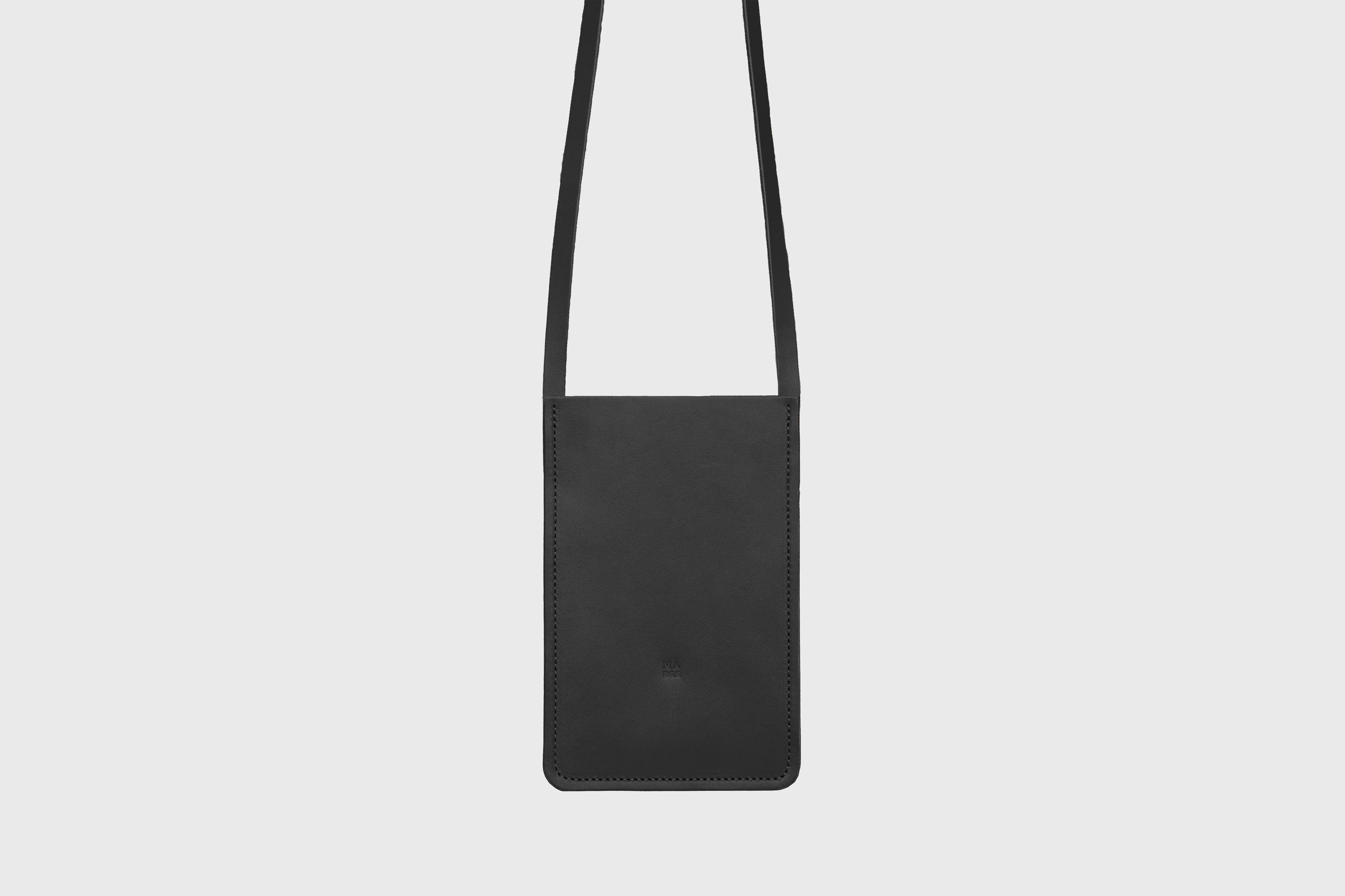 Neck Pouch Leather In Black Color Vegetable Tanned Leather Minimalistic Design Atelier Madre Manuel Dreesmann Barcelona Spain