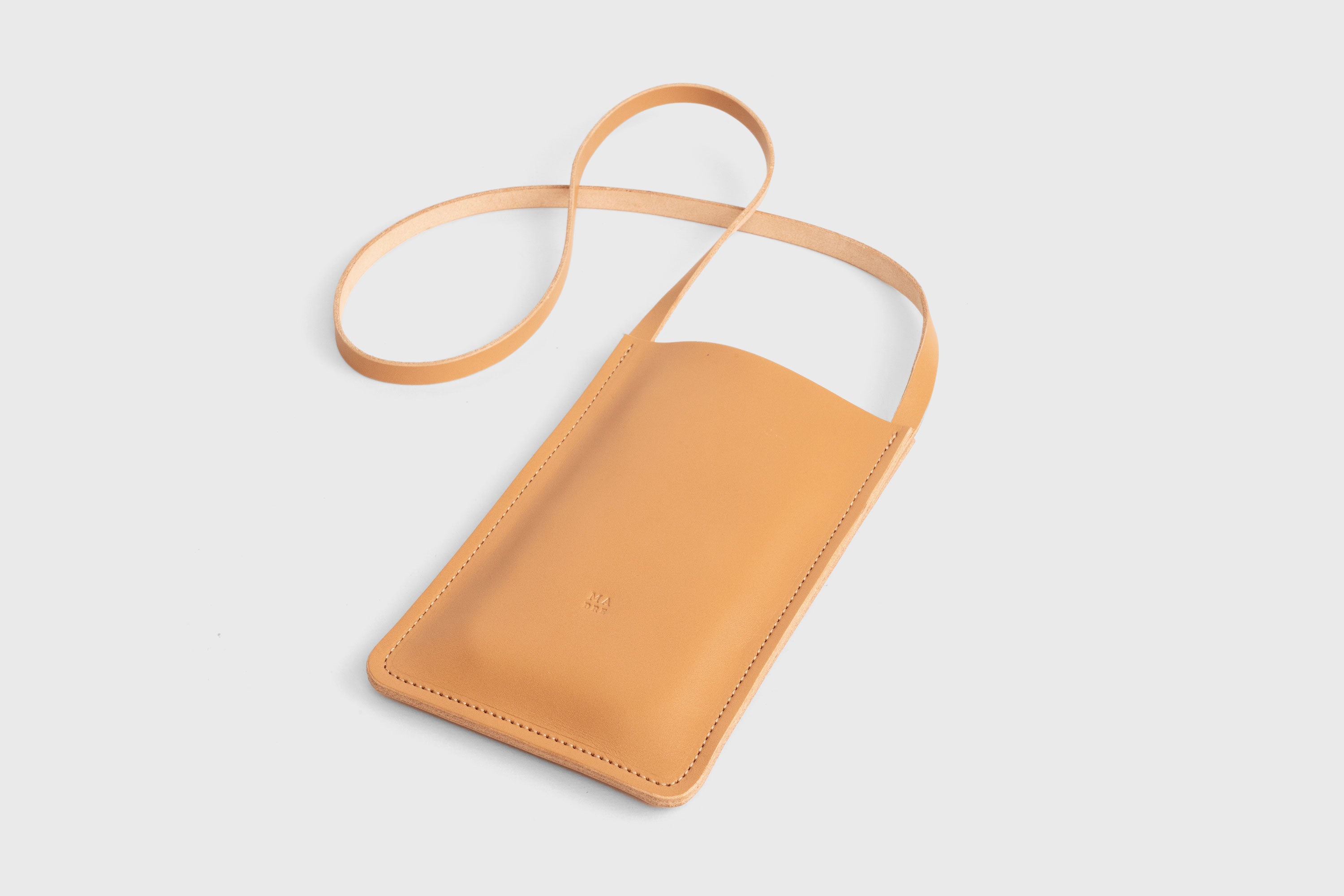 Neck Pouch Leather In Brown Color Vegetable Tanned Leather Minimalistic Design Atelier Madre Manuel Dreesmann Barcelona Spain