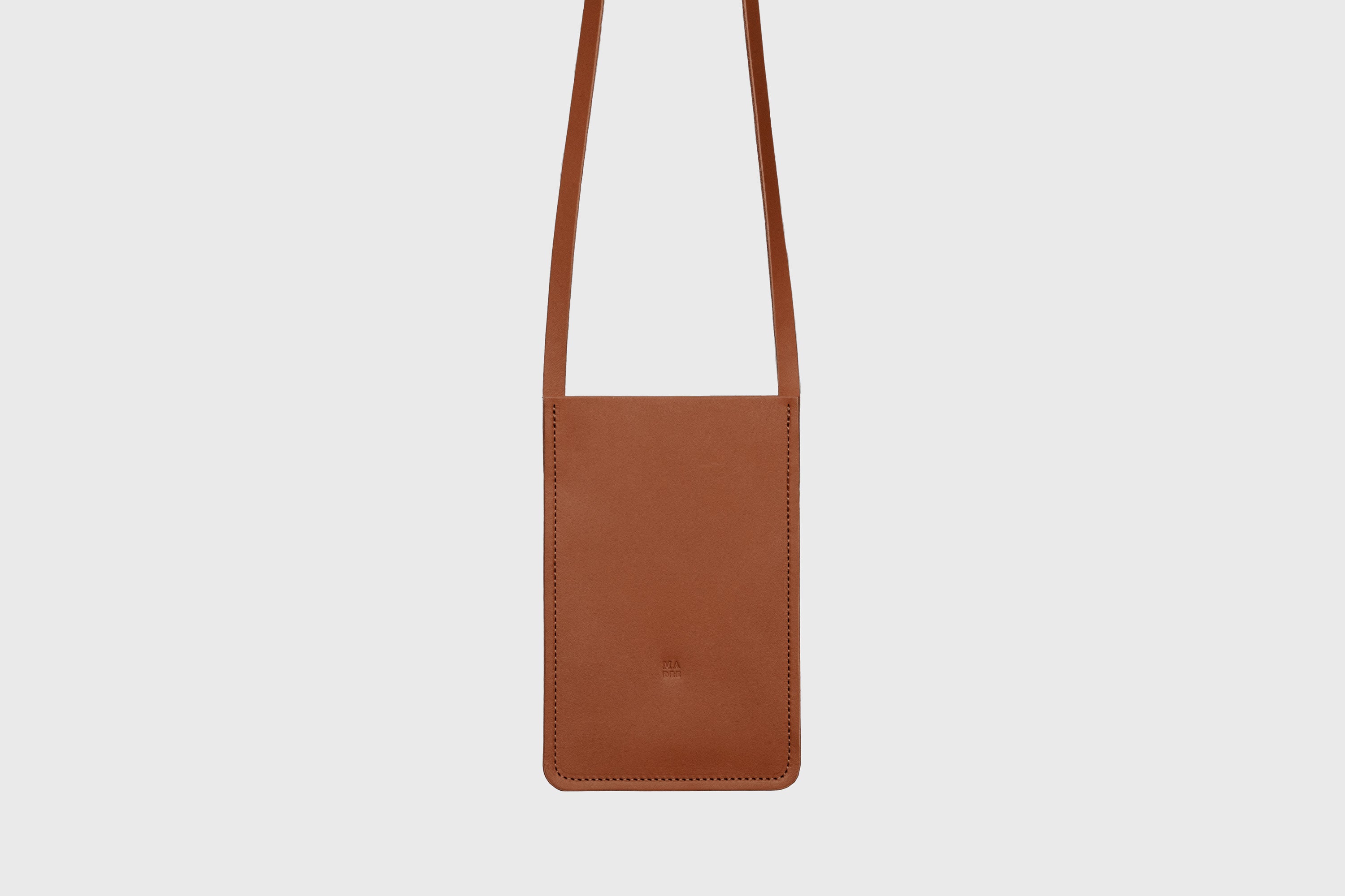 Neck Pouch Leather In Dark Brown Color Vegetable Tanned Leather Minimalistic Design Atelier Madre Manuel Dreesmann Barcelona Spain