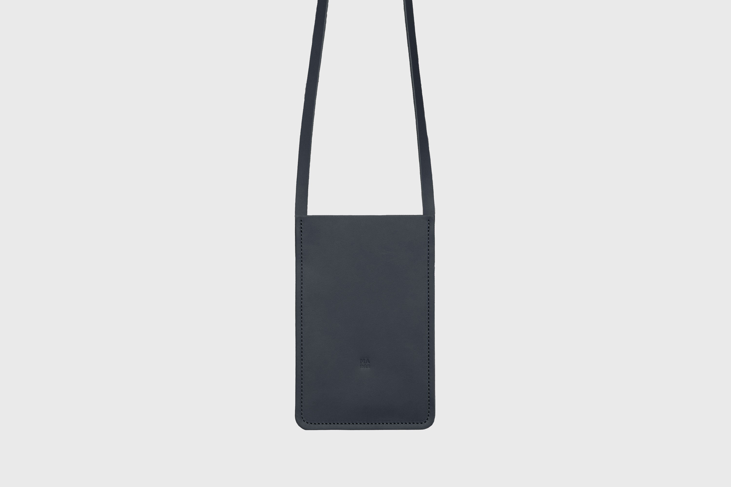 Neck Pouch Leather In Marine Blue Color Vegetable Tanned Leather Minimalistic Design Atelier Madre Manuel Dreesmann Barcelona Spain