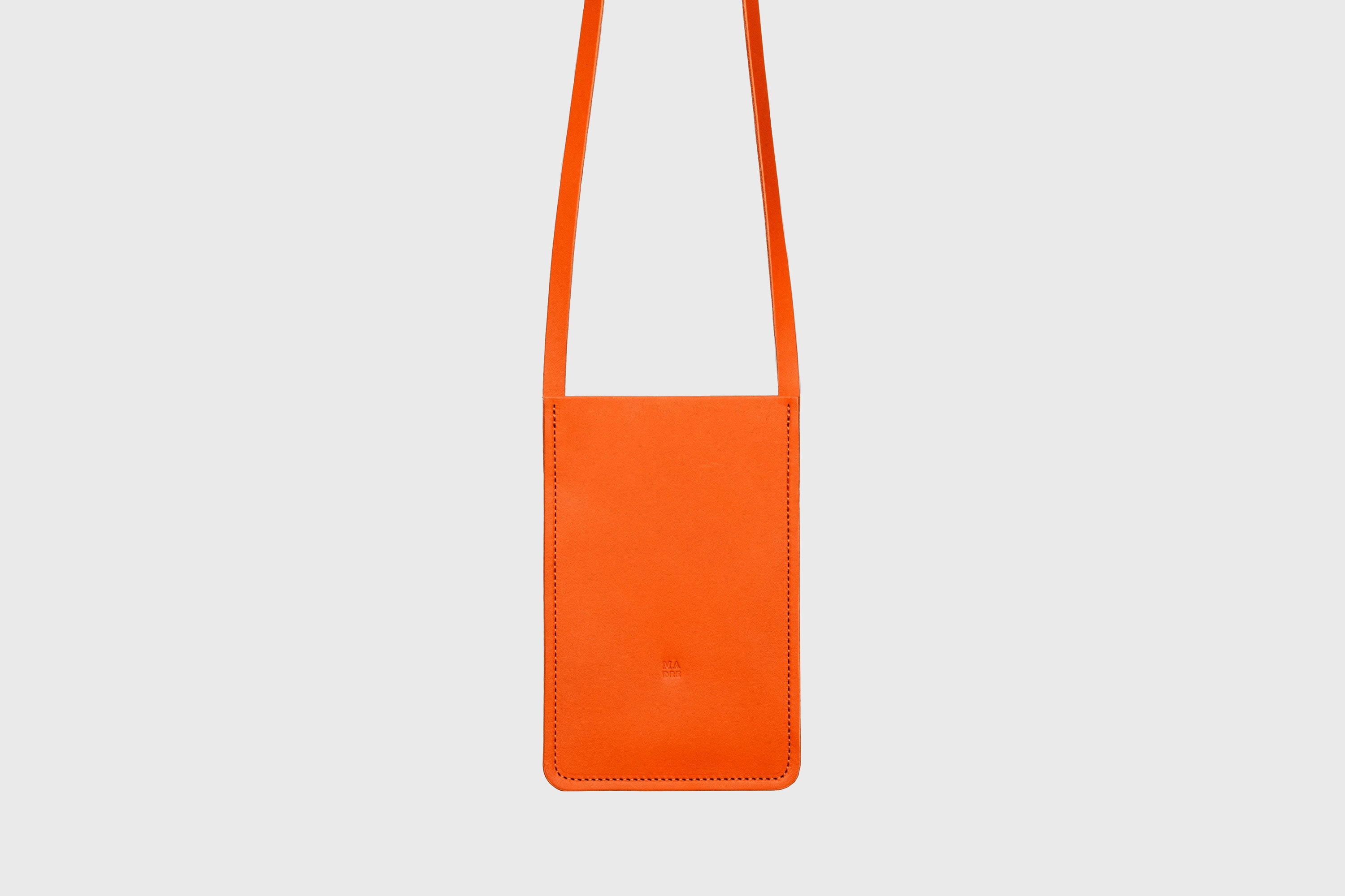 Neck Pouch Leather In Orange Color Vegetable Tanned Leather Minimalistic Design Atelier Madre Manuel Dreesmann Barcelona Spain